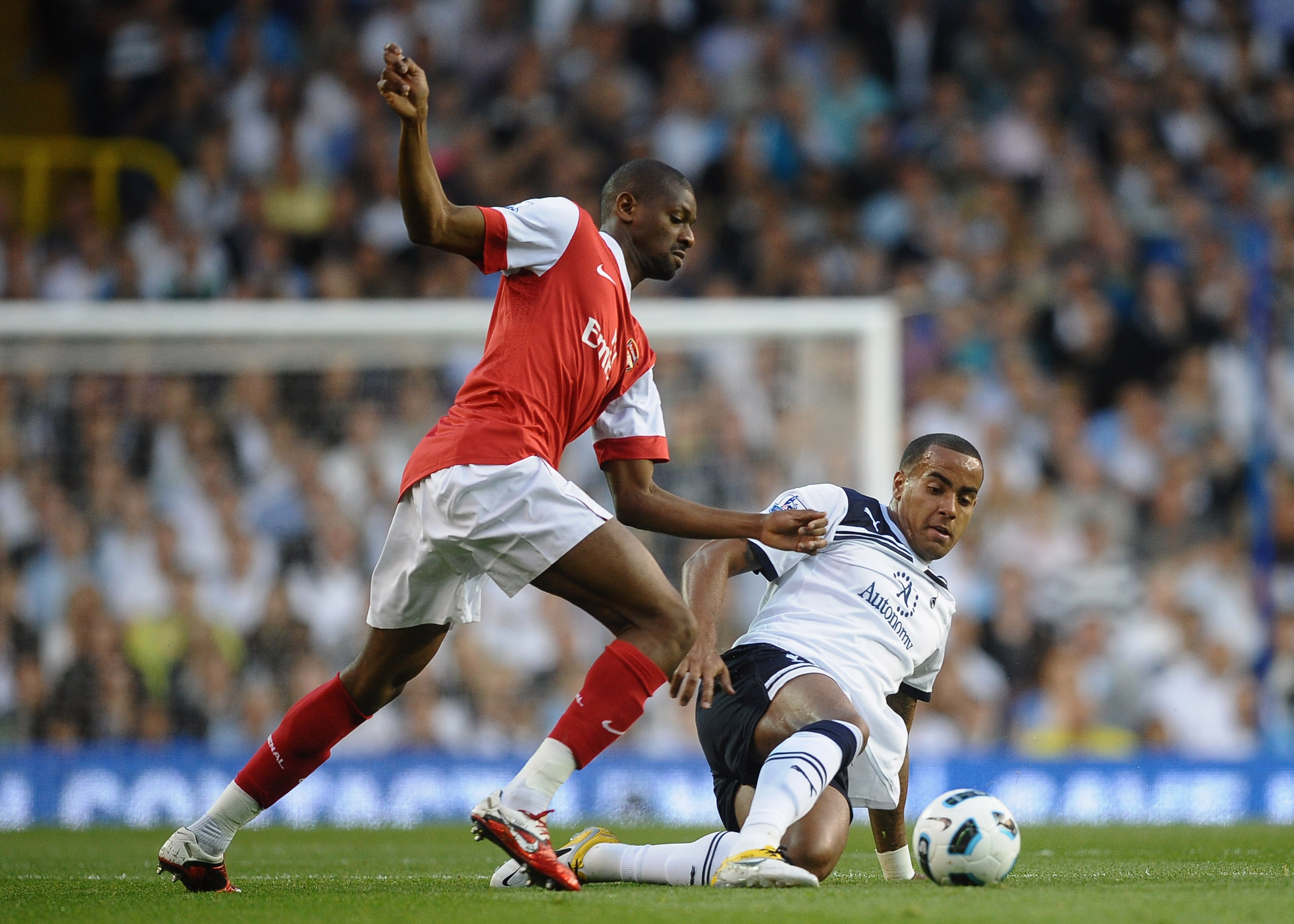 LONDON, ENGLAND - APRIL 20: Abou Diaby of Arsenal battles for the ball with Tom Huddlestone of Spurs during the Barclays Premier League match between Tottenham Hotspur and Arsenal at White Hart Lane on April 20, 2011 in London, England.  (Photo by Laurenc