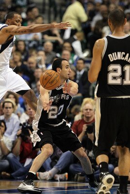DALLAS - APRIL 21:  Guard Manu Ginobili #20 of the San Antonio Spurs passes the ball in front of Shawn Marion #0 of the Dallas Mavericks in Game Two of the Western Conference Quarterfinals during the 2010 NBA Playoffs at American Airlines Center on April
