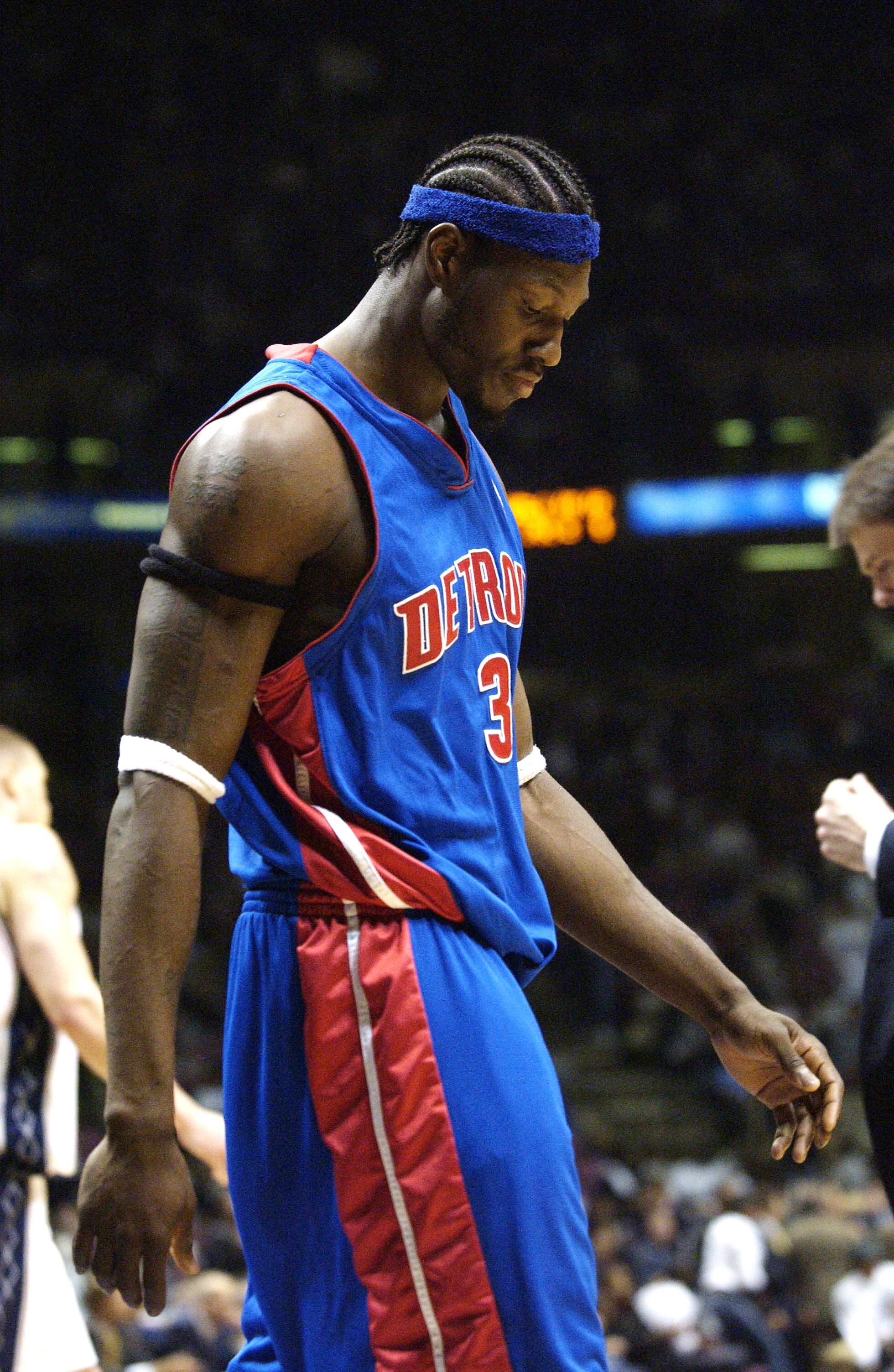 EAST RUTHERFORD, NJ - MAY 22:  Ben Wallace #3 of the Detroit Pistons heads to the bench during the fourth quarter of game three of the Eastern Conference Finals during the 2003 NBA Playoffs against the New Jersey Nets on May 22, 2003 at Continental Airlin