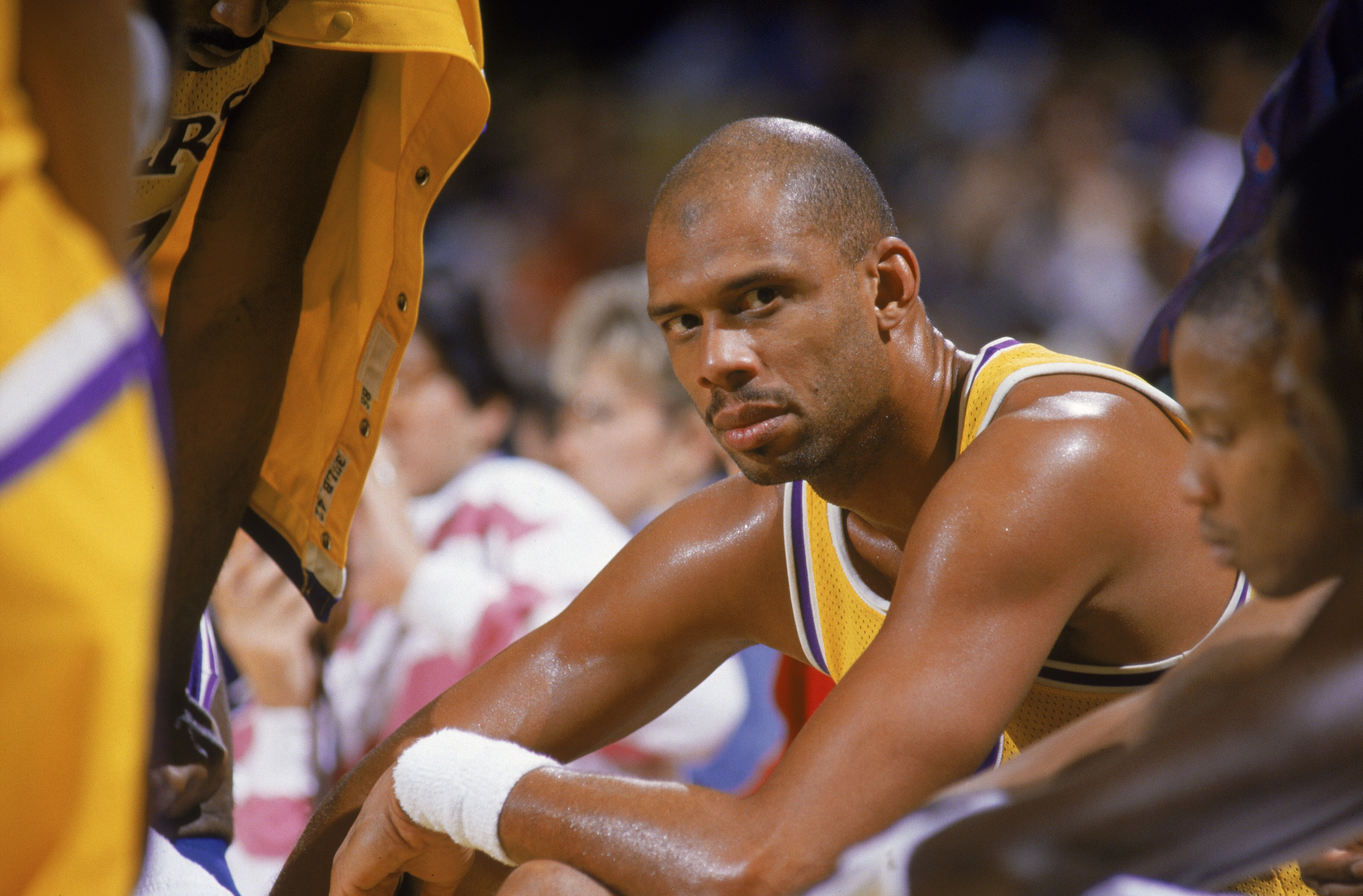 LOS ANGELES - 1987:  Kareem Abdul-Jabbar #33 of the Los Angeles Lakers sits on the bench during an NBA game at the Great Western Forum in Los Angeles, California in 1987. (Photo by: Mike Powell/Getty Images)