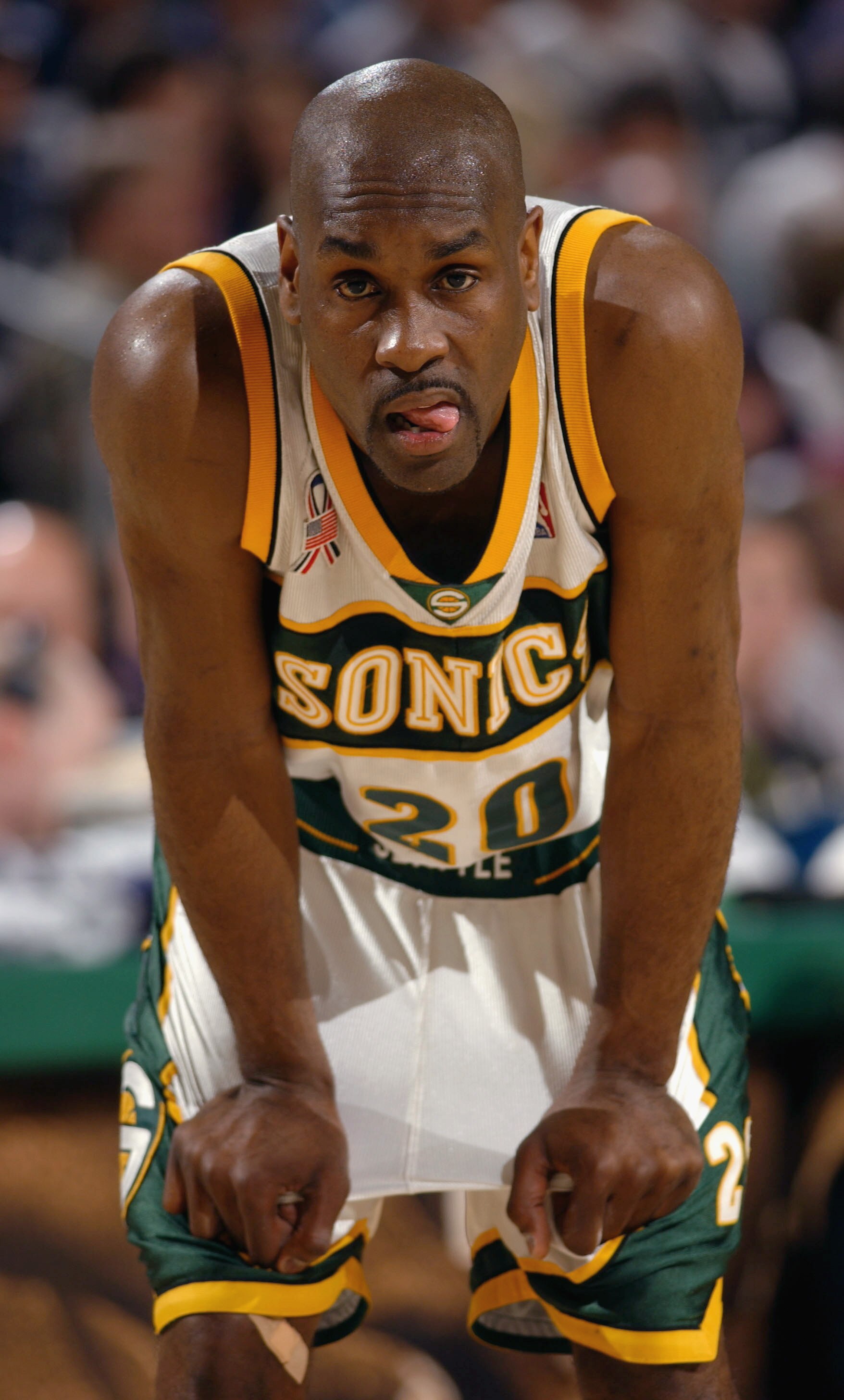 SEATTLE- APRIL 27:  Point guard Gary Payton #20 of the Seattle SuperSonics rests during game three of the Western Conference quarterfinals series against the San Antonio Spurs during the 2002 NBA Playoffs at Key Arena in Seattle, Washington on April 27, 2