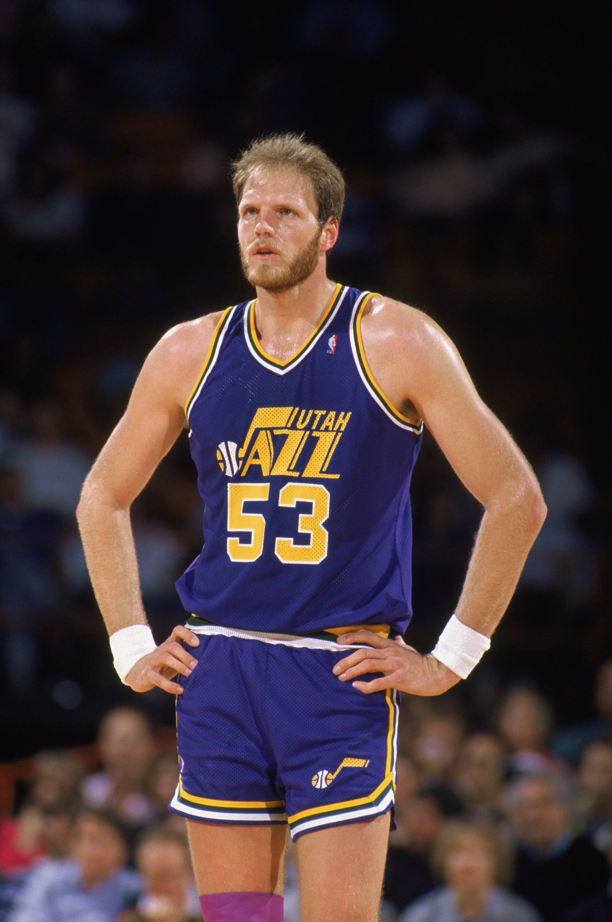 DENVER - 1989:  Mark Eaton #53 of the Utah Jazz stands on the court during an NBA game against the Denver Nuggets at McNichols Sports Arena in Denver, Colorado in 1989. (Photo by Tim DeFrisco/Getty Images)