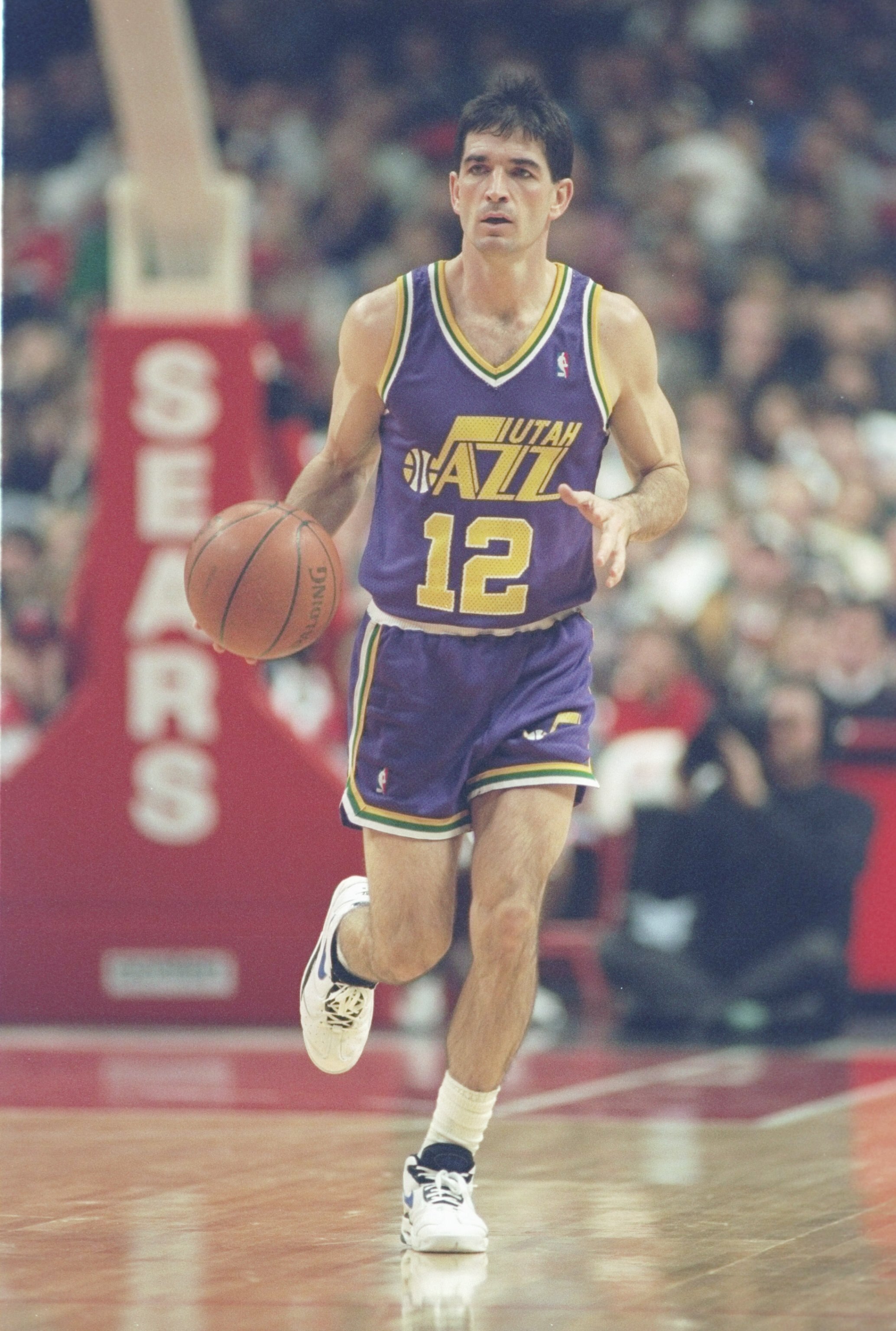 17 Dec 1994: Guard John Stockton of the Utah Jazz moves the ball during a game against the Chicago Bulls at the United Center in Chicago, Illinois. The Jazz won the game, 97-89.
