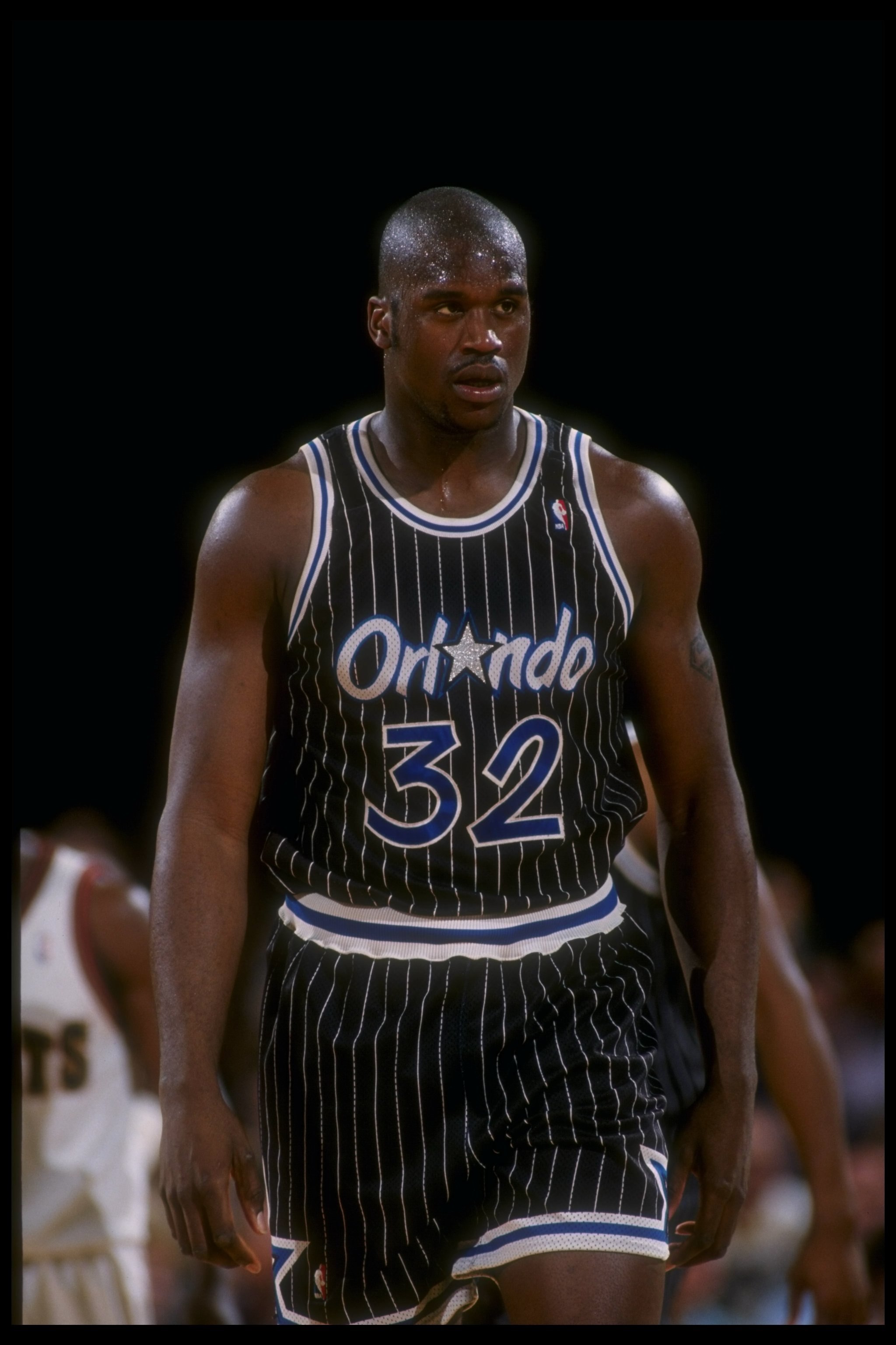 4 Mar 1994:  Center Shaquille O''Neal of the Orlando Magic looks on during a game against the Denver Nuggets at McNichols Arena in Denver, Colorado. Mandatory Credit: Tim DeFrisco  /Allsport Mandatory Credit: Tim DeFrisco  /Allsport
