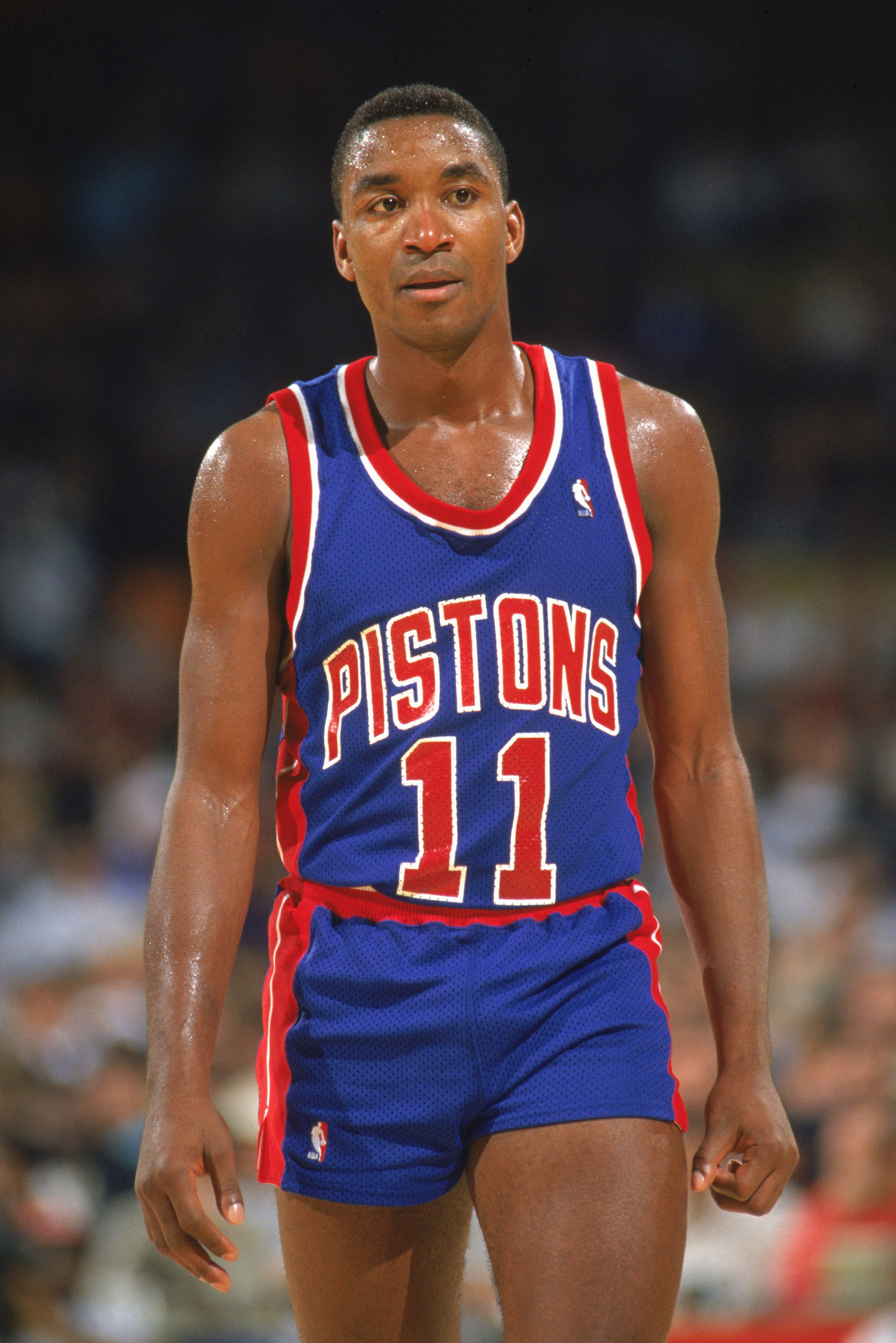 1989:  Isiah Thomas #11 of the Detroit Pistons walks on the court during a game in the 1989-1990 NBA season.  (Photo by Mike Powell /Getty Images)