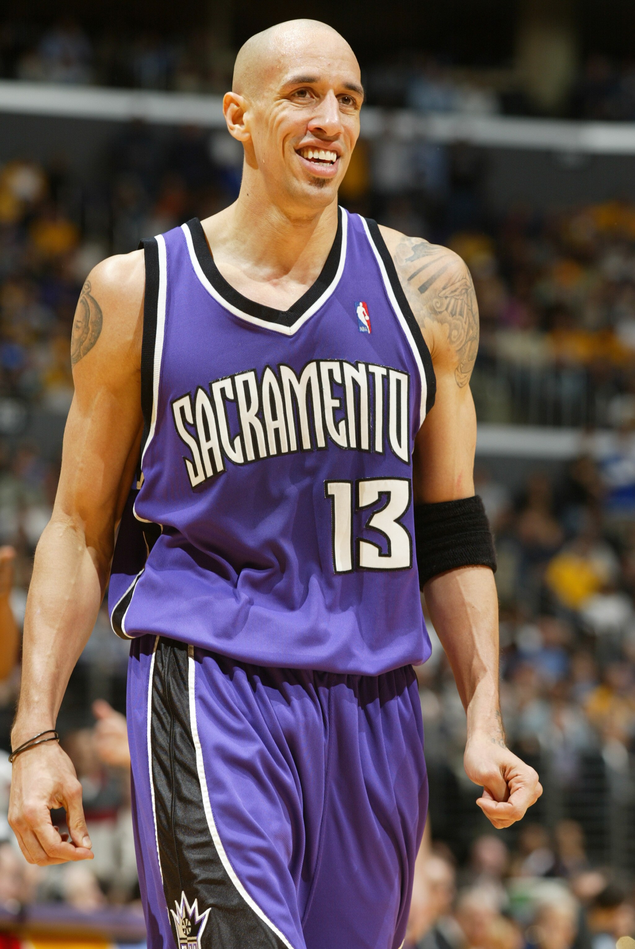 LOS ANGELES - FEBRUARY 26:  Doug Christie #13 of the Sacramento Kings smiles during the game against the Los Angeles Lakers at Staples Center on February 26, 2004 in Los Angeles, California.  The Kings won 103-101.  NOTE TO USER: User expressly acknowledg