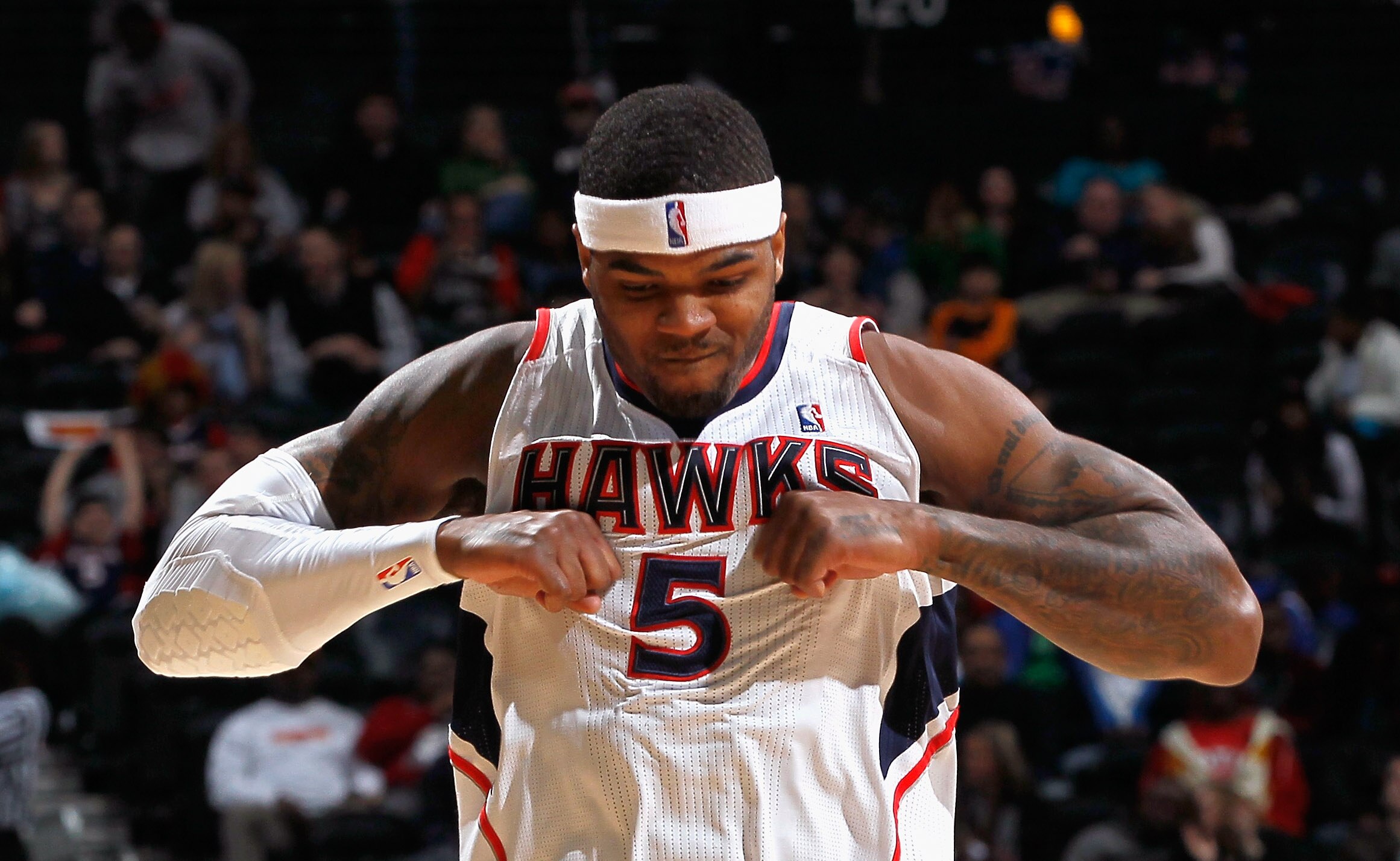 ATLANTA, GA - FEBRUARY 12:  Josh Smith #5 of the Atlanta Hawks reacts after hitting a three-point basket against the Charlotte Bobcats at Philips Arena on February 12, 2011 in Atlanta, Georgia.  NOTE TO USER: User expressly acknowledges and agrees that, b