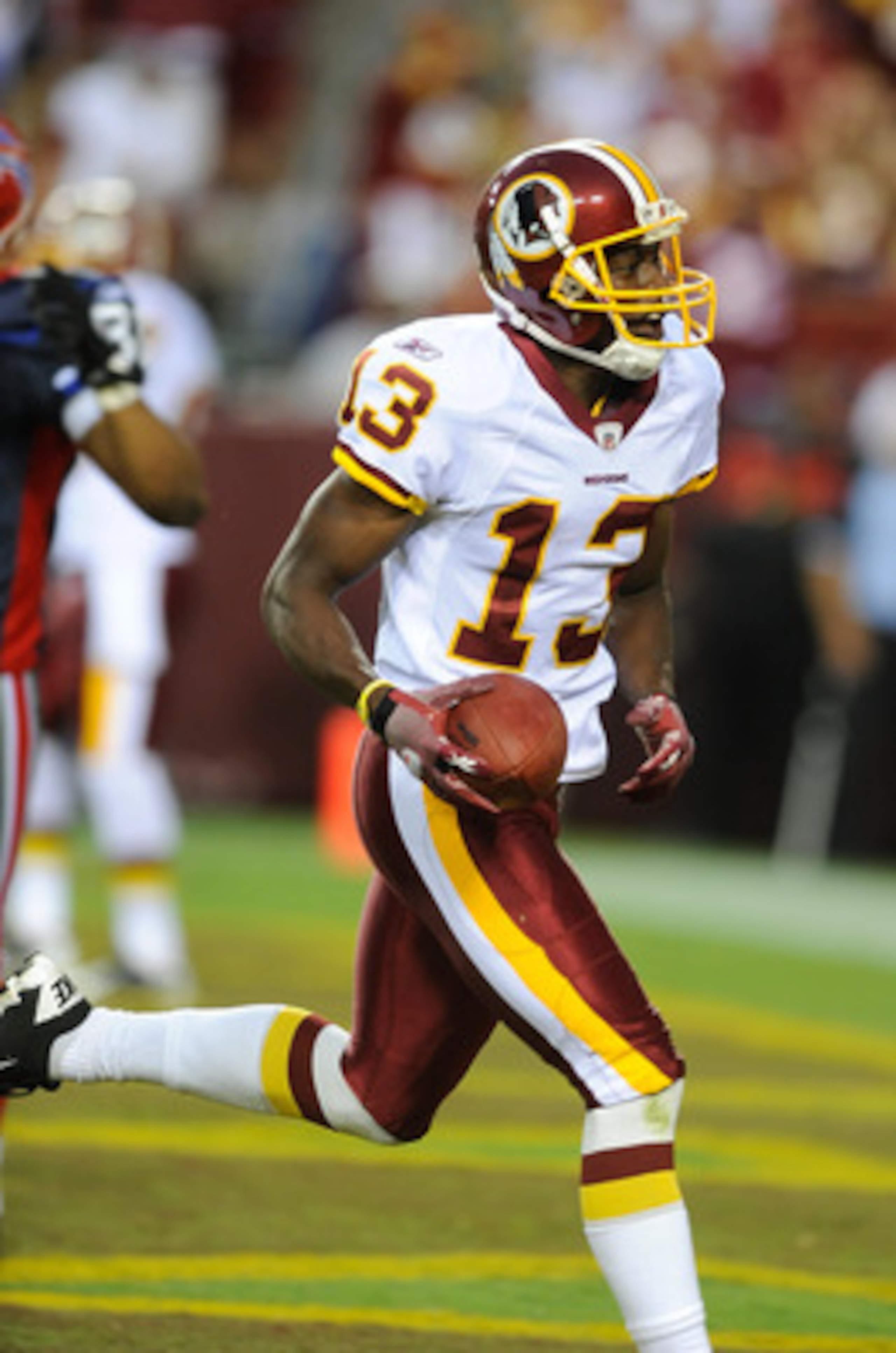 LANDOVER, MD - AUGUST 13:  Anthony Armstrong #13 of the Washington Redskins celebrates after scoring a touchdown during the preseason game against the Buffalo Bills at FedEx Field on August 13, 2010 in Landover, Maryland.  (Photo by Greg Fiume/Getty Image