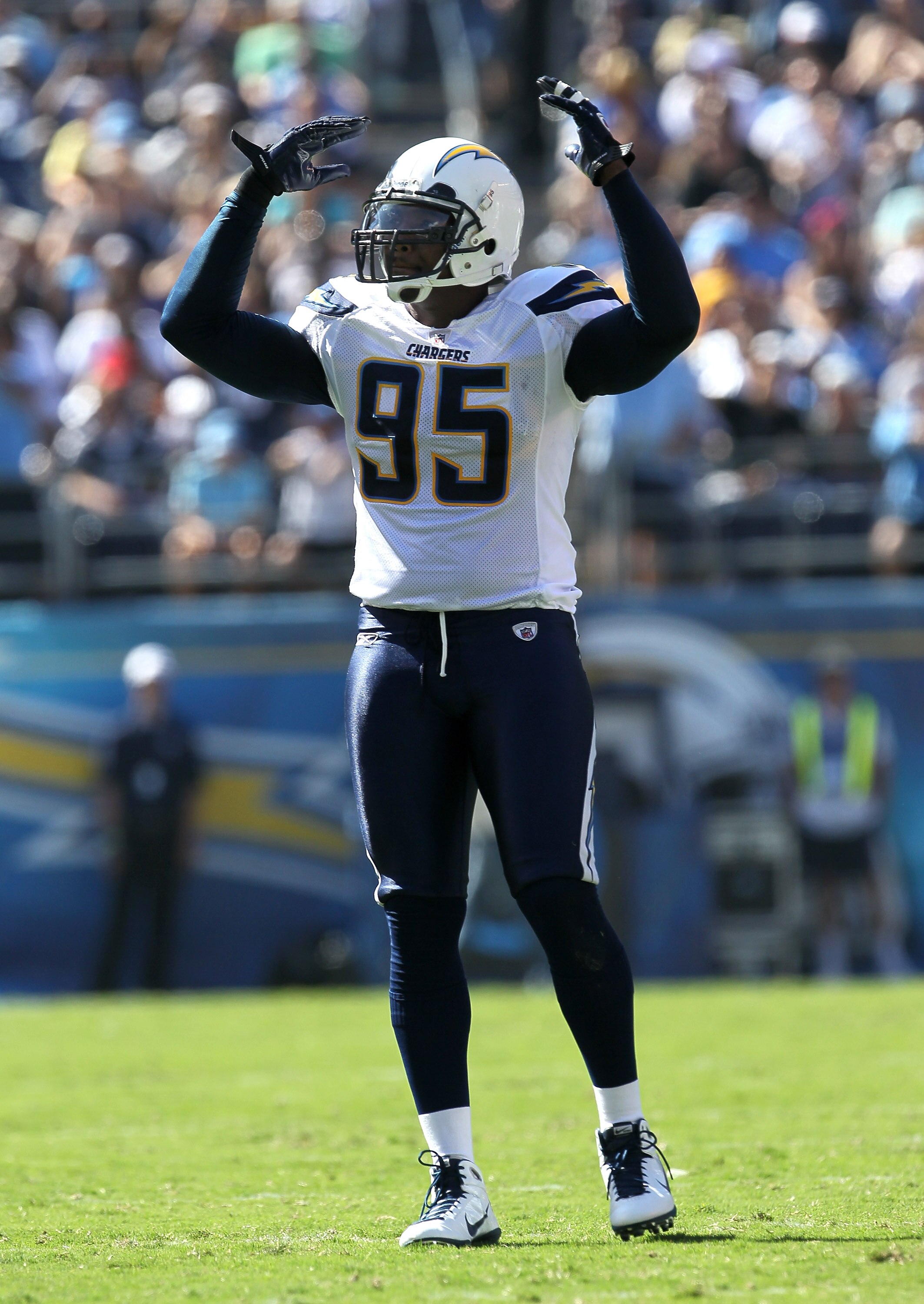 SAN DIEGO - SEPTEMBER 19:  Linebacker Shaun Phillips #95 of the San Diego Chargers exhorts the crowd during the game with the Jacksonville Jaguars at Qualcomm Stadium on September 19, 2010 in San Diego, California. The Chargers won 38-13.  (Photo by Steph