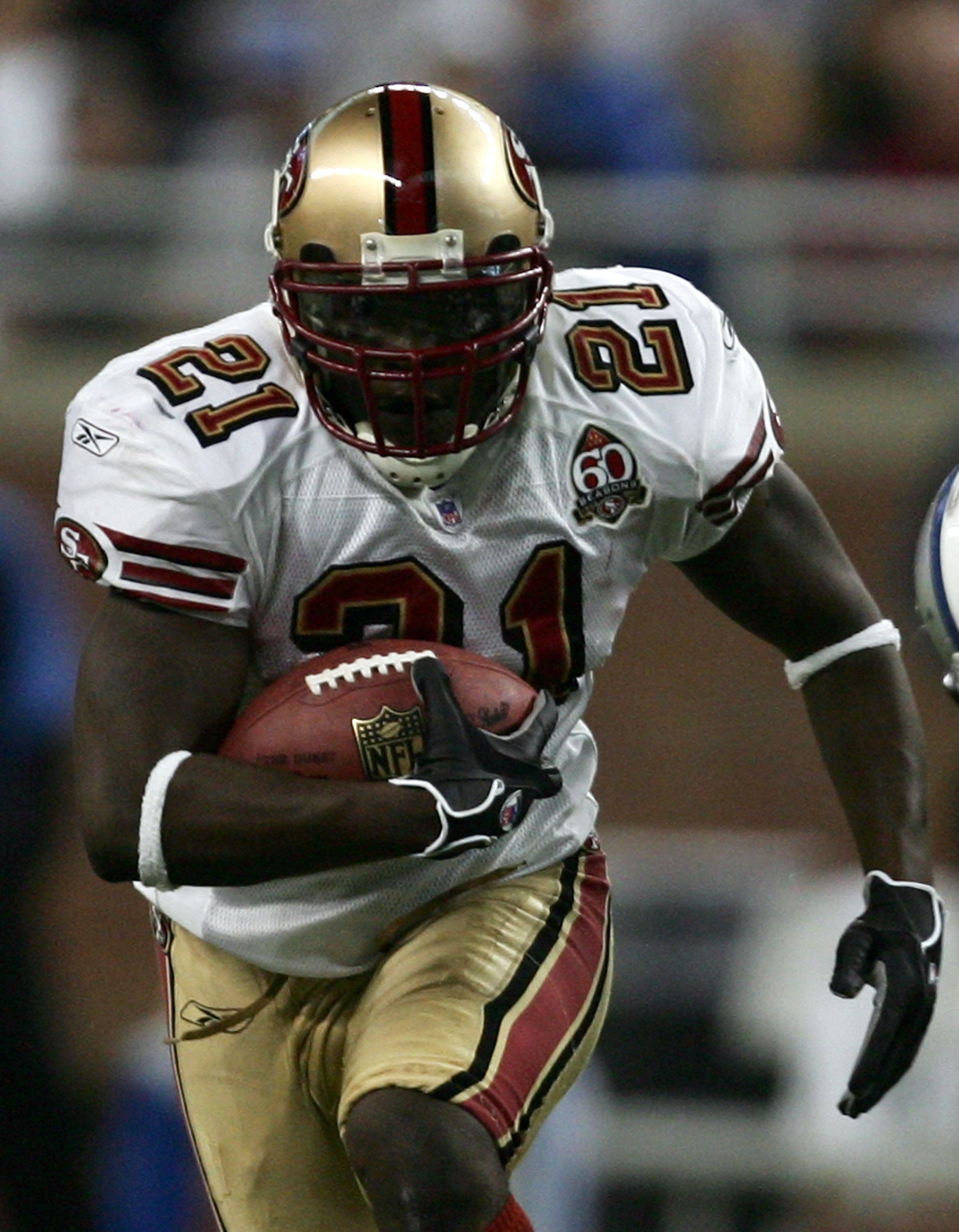DETROIT - NOVEMBER 12:  Frank Gore #21 of the San Francisco 49ers carries the ball against the Detroit Lions during the second quarter at Ford Field on November 12, 2006 in Detroit, Michigan.  Gore rushed for 148 yards as the 49ers won 19-13.  (Photo by H