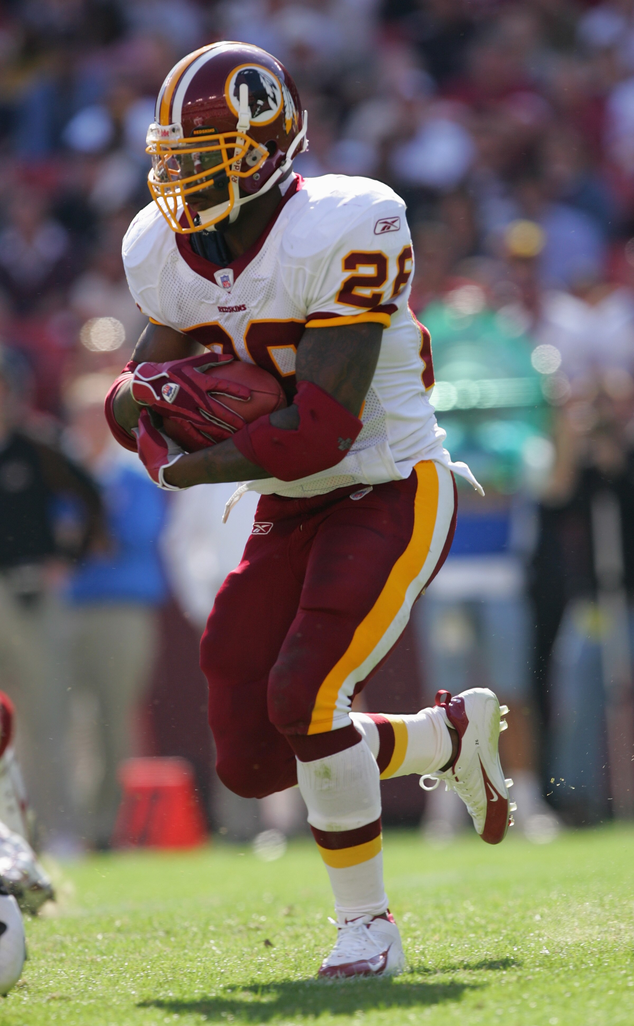 LANDOVER, MD - OCTOBER 23:  Clinton Portis #26 of the Washington Redskins carries the ball during the game with the San Francisco 49ers on October 23, 2005 at Fed Ex Field in Landover, Maryland. The Redskins won 52-17. (Photo by Jamie Squire/Getty Images)
