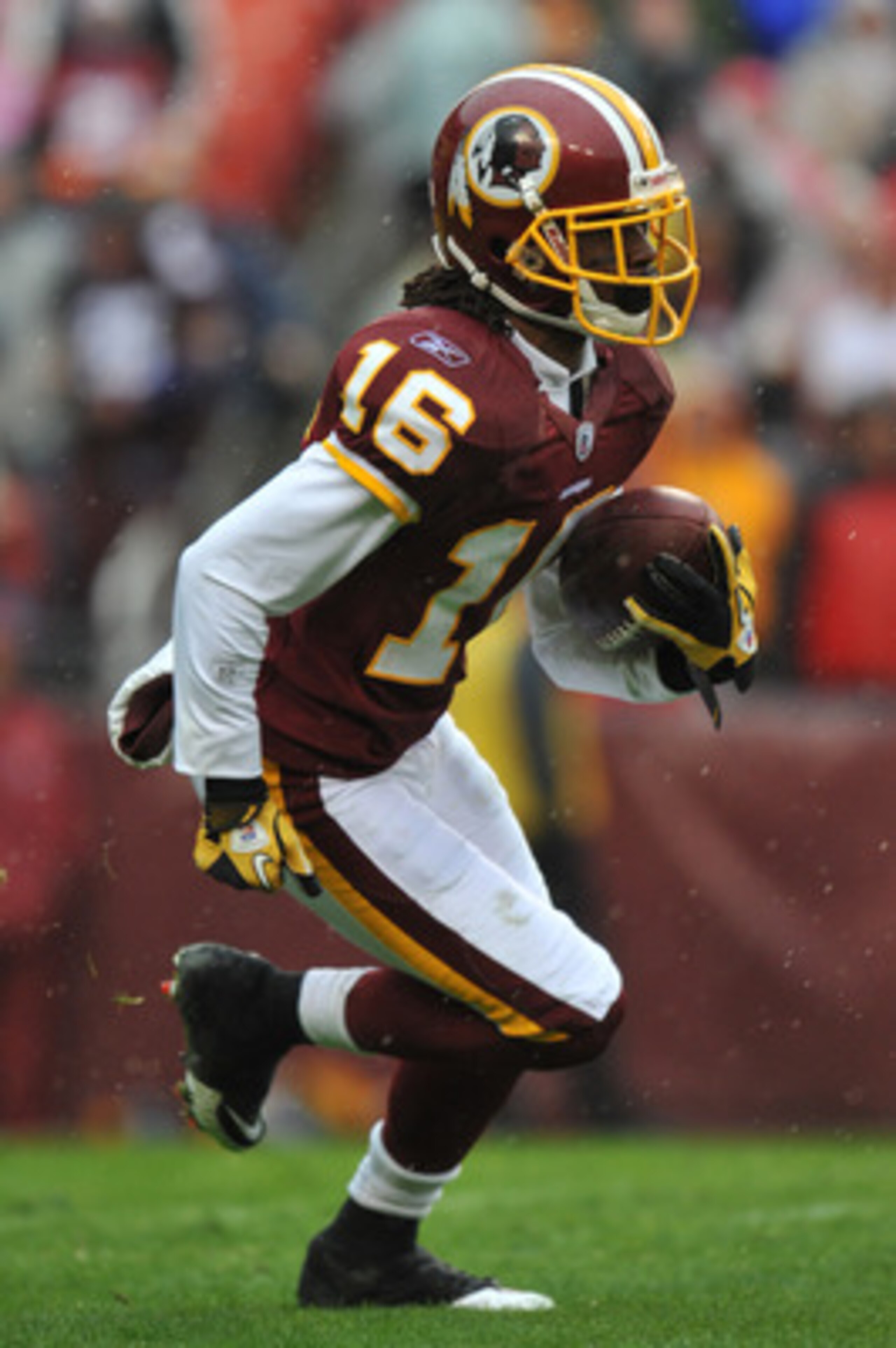 LANDOVER, MD - DECEMBER 12:  Brandon Banks #16 of the Washington Redskins runs the ball during the game against the Tampa Bay Buccaneers  at FedExField on December 12, 2010 in Landover, Maryland. The Buccaneers defeated the Redskins 17-16. (Photo by Larry
