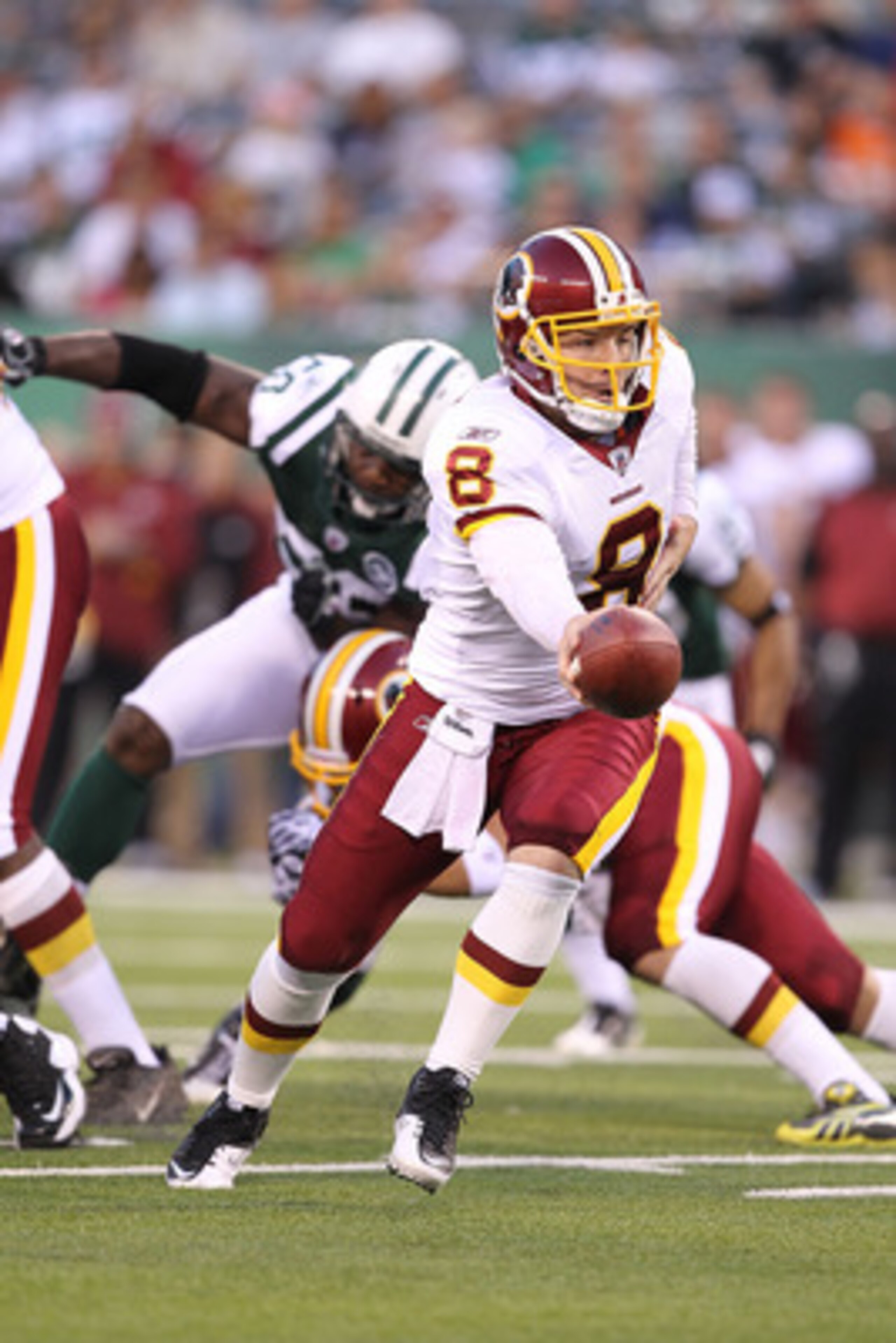 EAST RUTHERFORD, NJ - AUGUST 27:  Rex Grossman #8  of the Washington Redskins in action against  the New York Jets during their preseason game on August 27, 2010 at the New Meadowlands Stadium  in East Rutherford, New Jersey.  (Photo by Al Bello/Getty Ima