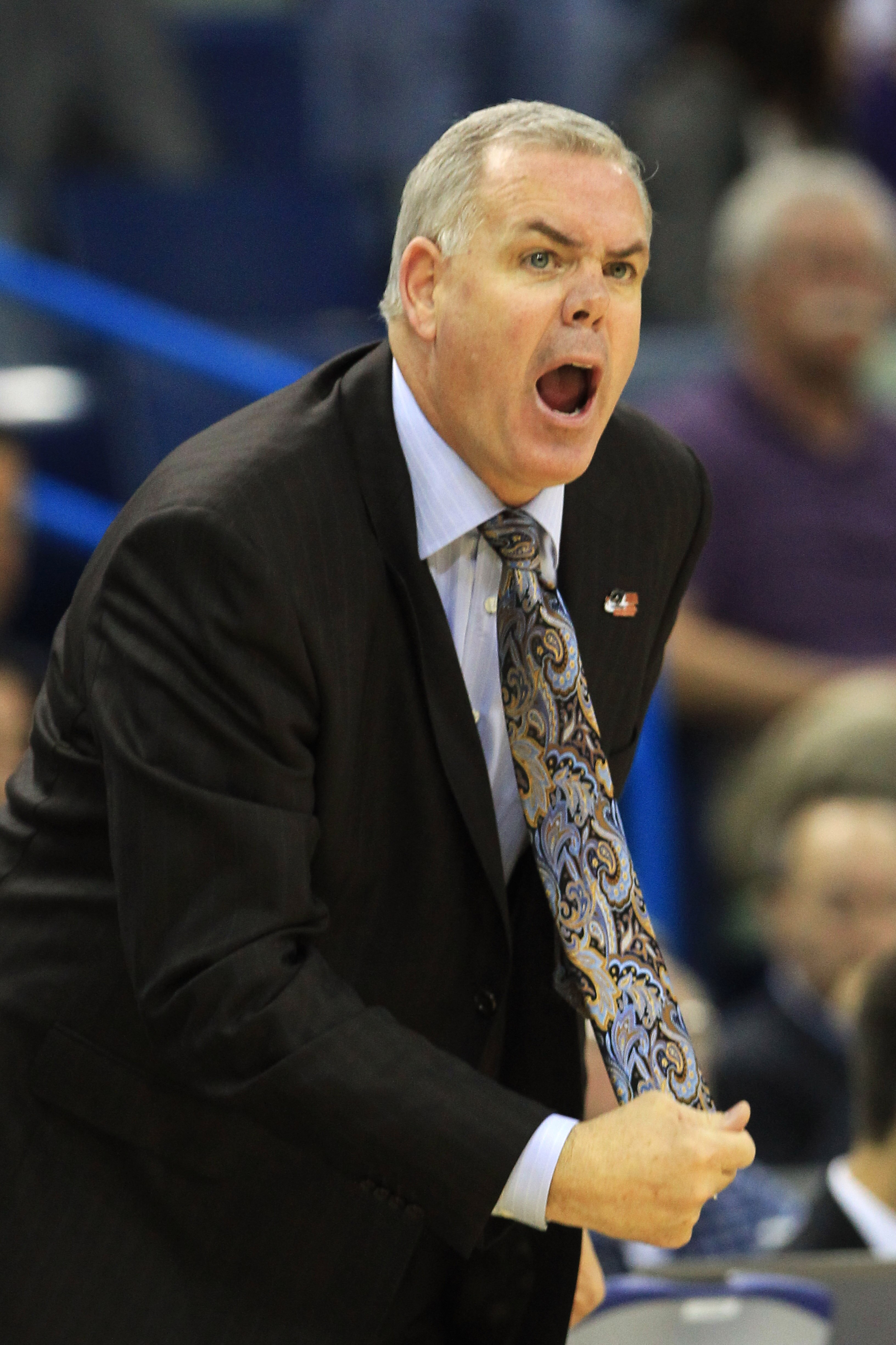 NEW ORLEANS, LA - MARCH 24:  Head coach Dave Rose of the Brigham Young Cougars yells to his team during their game against the Florida Gators in the Southeast regional of the 2011 NCAA men's basketball tournament at New Orleans Arena on March 24, 2011 in