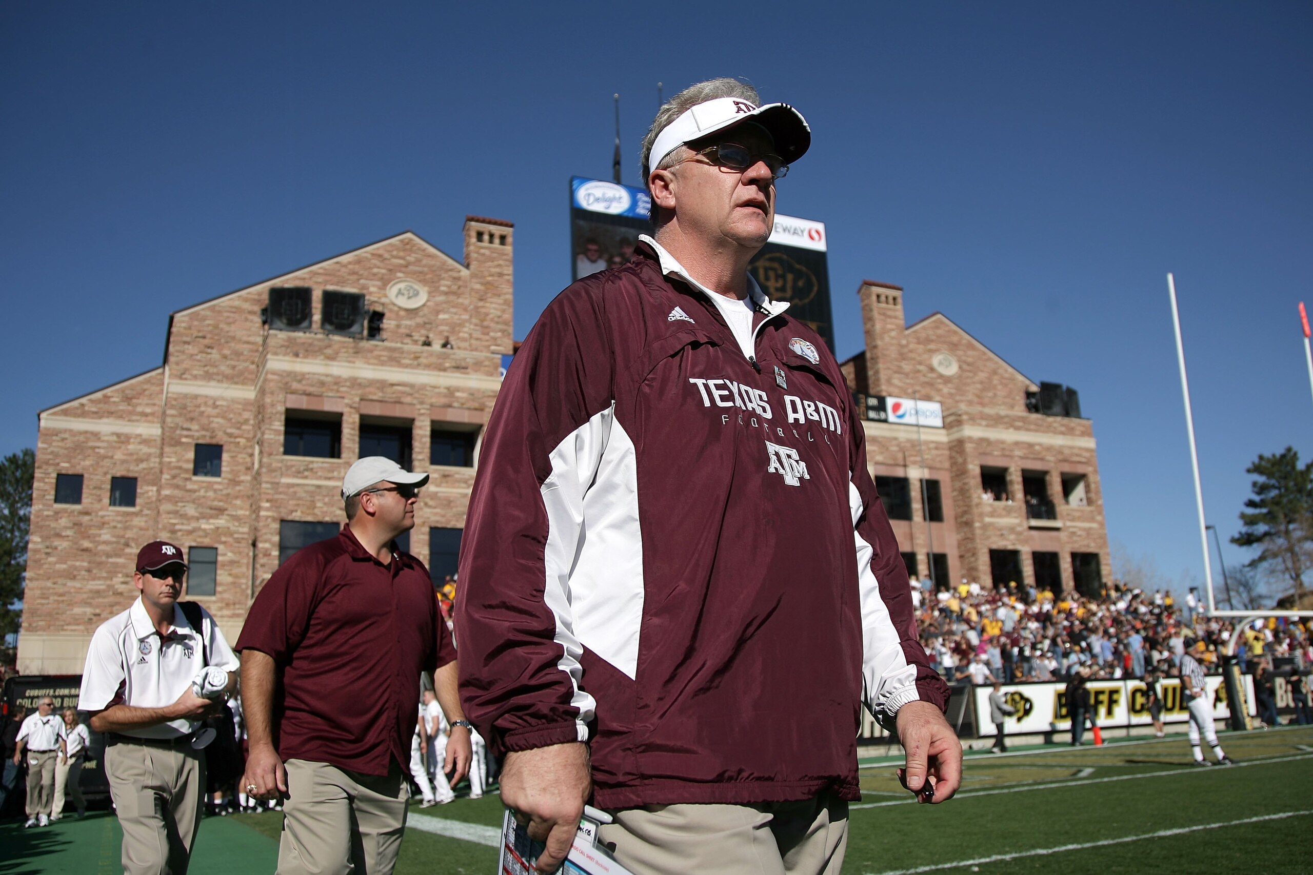 BOULDER, CO - NOVEMBER 07: Head coach Mike Sherman of the Texas A&M Aggies enters the field for the second half as he leads his team against the Colorado Buffaloes during NCAA college football action at Folsom Field on November 7, 2009 in Boulder, Colora BOULDER, CO - NOVEMBER 07: Head coach Mike Sherman of the Texas A&M Aggies enters the field for the second half as he leads his team against the Colorado Buffaloes during NCAA college football action at Folsom Field on November 7, 2009 in Boulder, Colora