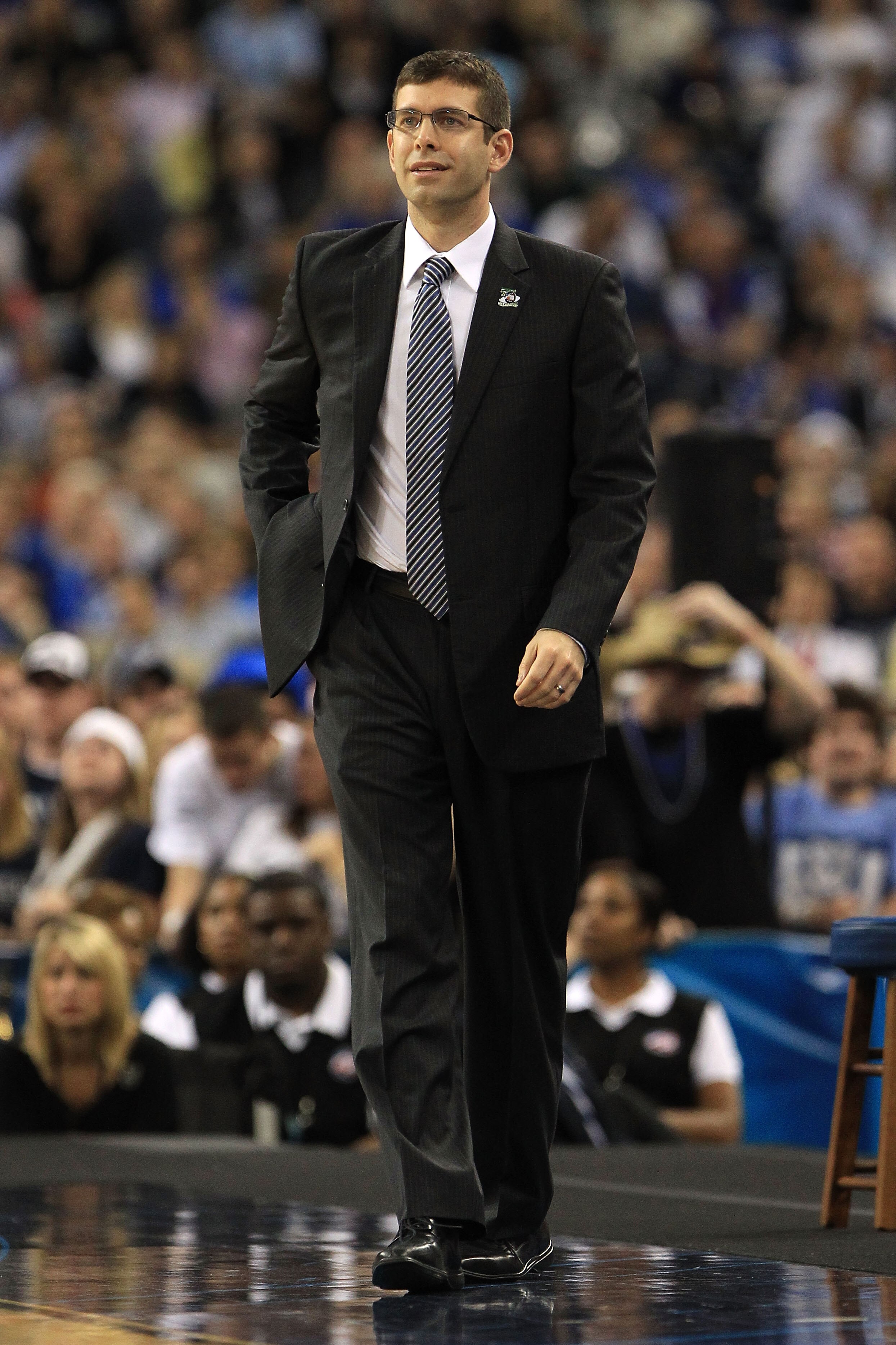 HOUSTON, TX - APRIL 04:  Head coach Brad Stevens of the Butler Bulldogs looks on from the sidelines against the Connecticut Huskies during the National Championship Game of the 2011 NCAA Division I Men's Basketball Tournament at Reliant Stadium on April 4