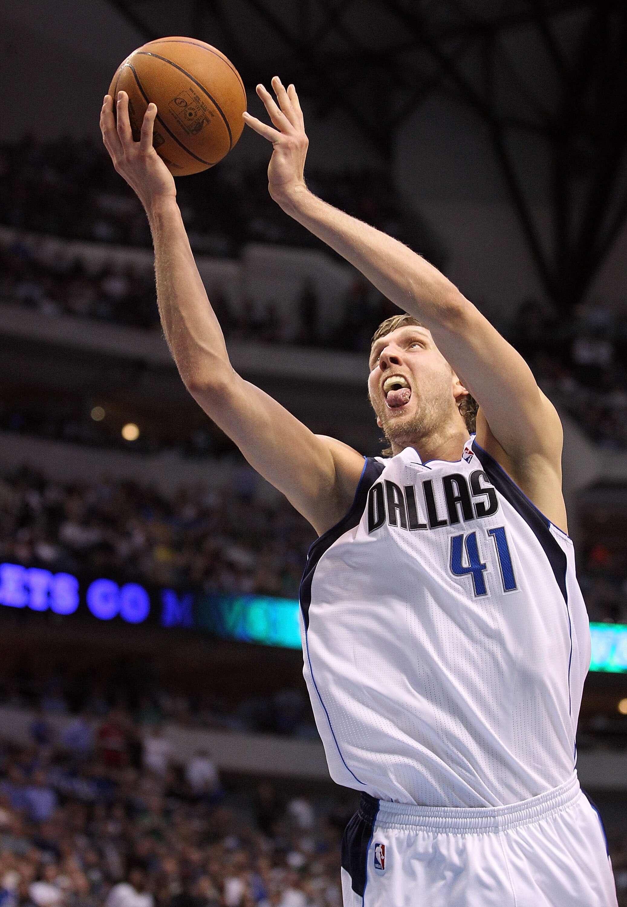 DALLAS, TX - APRIL 19:  Forward Dirk Nowitzki #41 of the Dallas Mavericks takes a shot against the Portland Trail Blazers in Game Two of the Western Conference Quarterfinals during the 2011 NBA Playoffs on April 19, 2011 at American Airlines Center in Dal