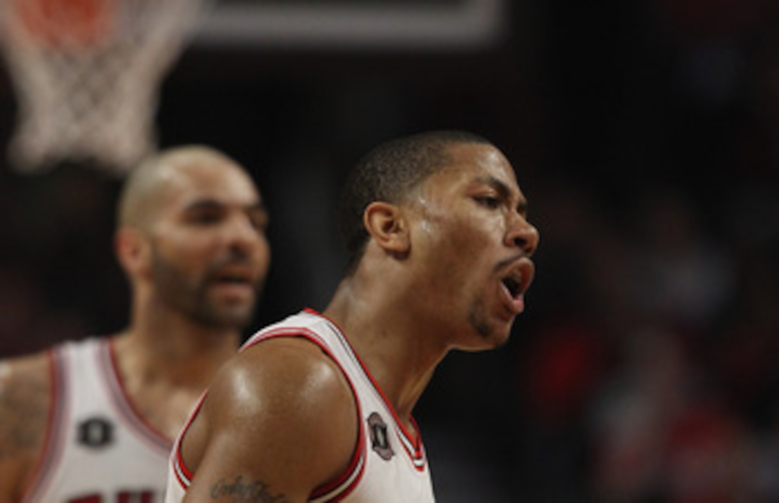 INDIANAPOLIS, IN - APRIL 21:  Carlos Boozer #5 of the Chicago Bulls celebrates after Derrick Rose hit the game winning shot against the Indiana Pacers in Game three of the Eastern Conference Quarterfinals in the 2011 NBA Playoffs on April 21, 2011  at Con