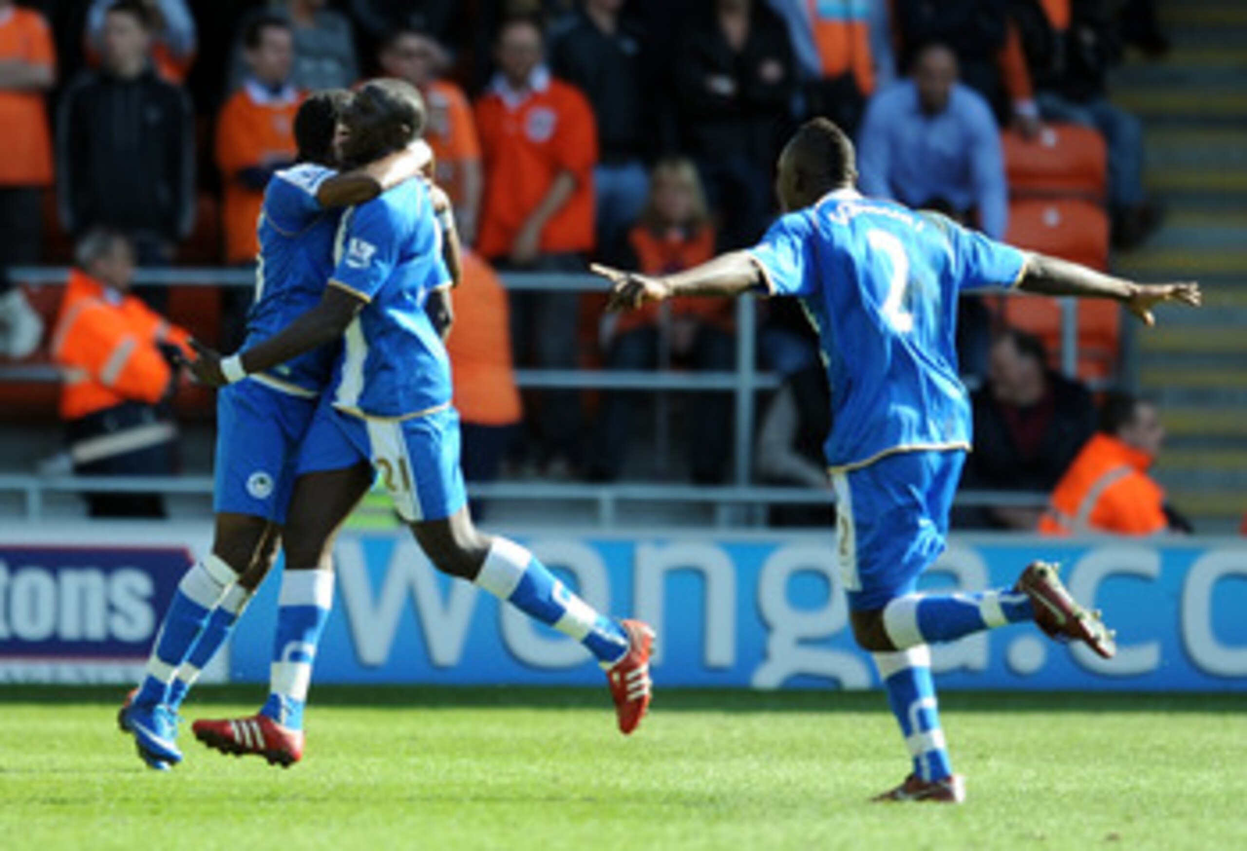BLACKPOOL, ENGLAND - APRIL 16: Mohamed Diame of Wigan Athletic celebrates scoring his side's third goal during the Barclays Premier League match between Blackpool and Wigan Athletic at Bloomfield Road on April 16, 2011 in Blackpool, England.  (Photo by Ch