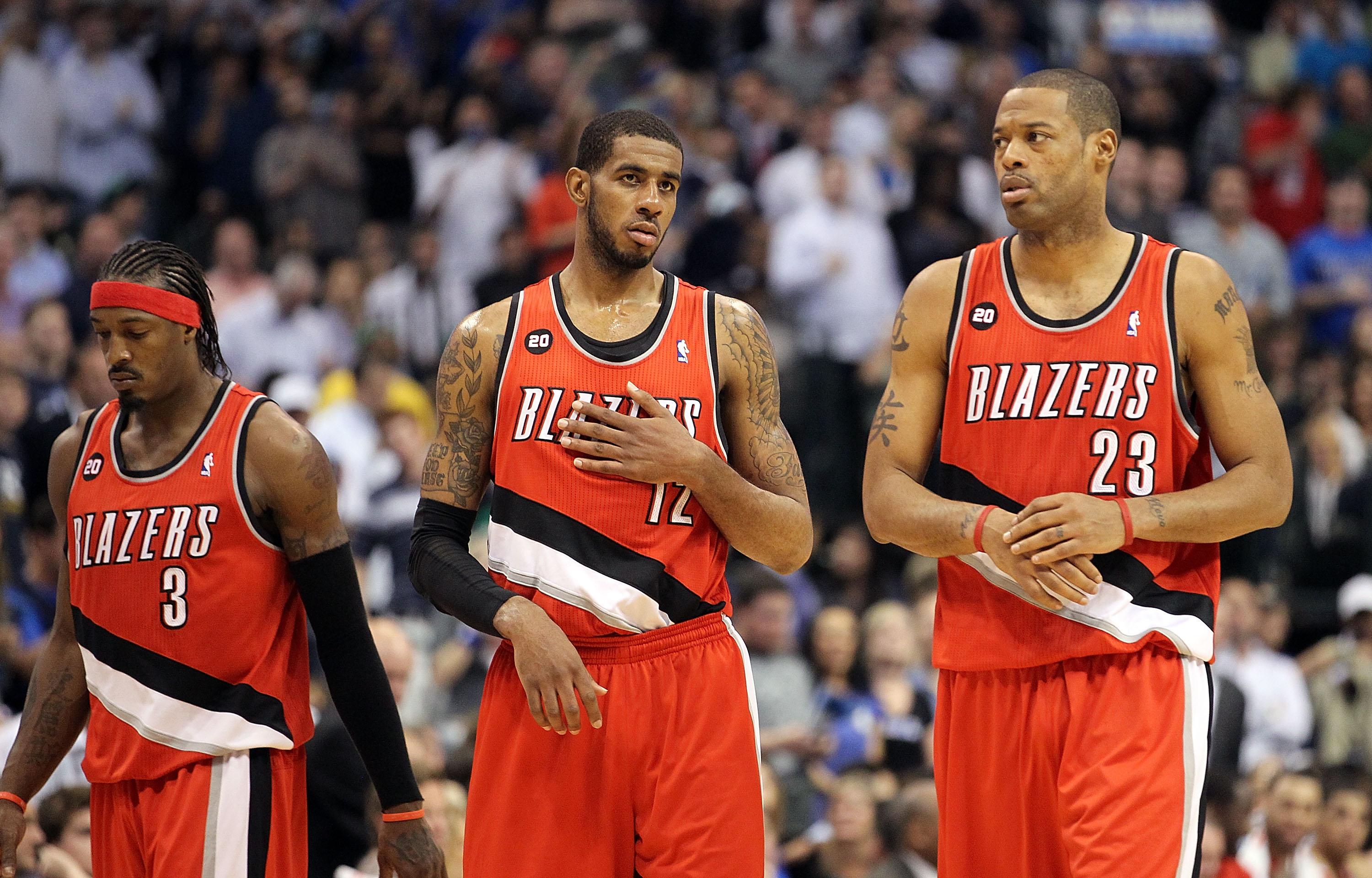 DALLAS, TX - APRIL 19:  (L-R) Gerald Wallace #3, LaMarcus Aldridge #12 and Marcus Camby #23 of the Portland Trail Blazers during a loss against the Dallas Mavericks in Game Two of the Western Conference Quarterfinals during the 2011 NBA Playoffs on April
