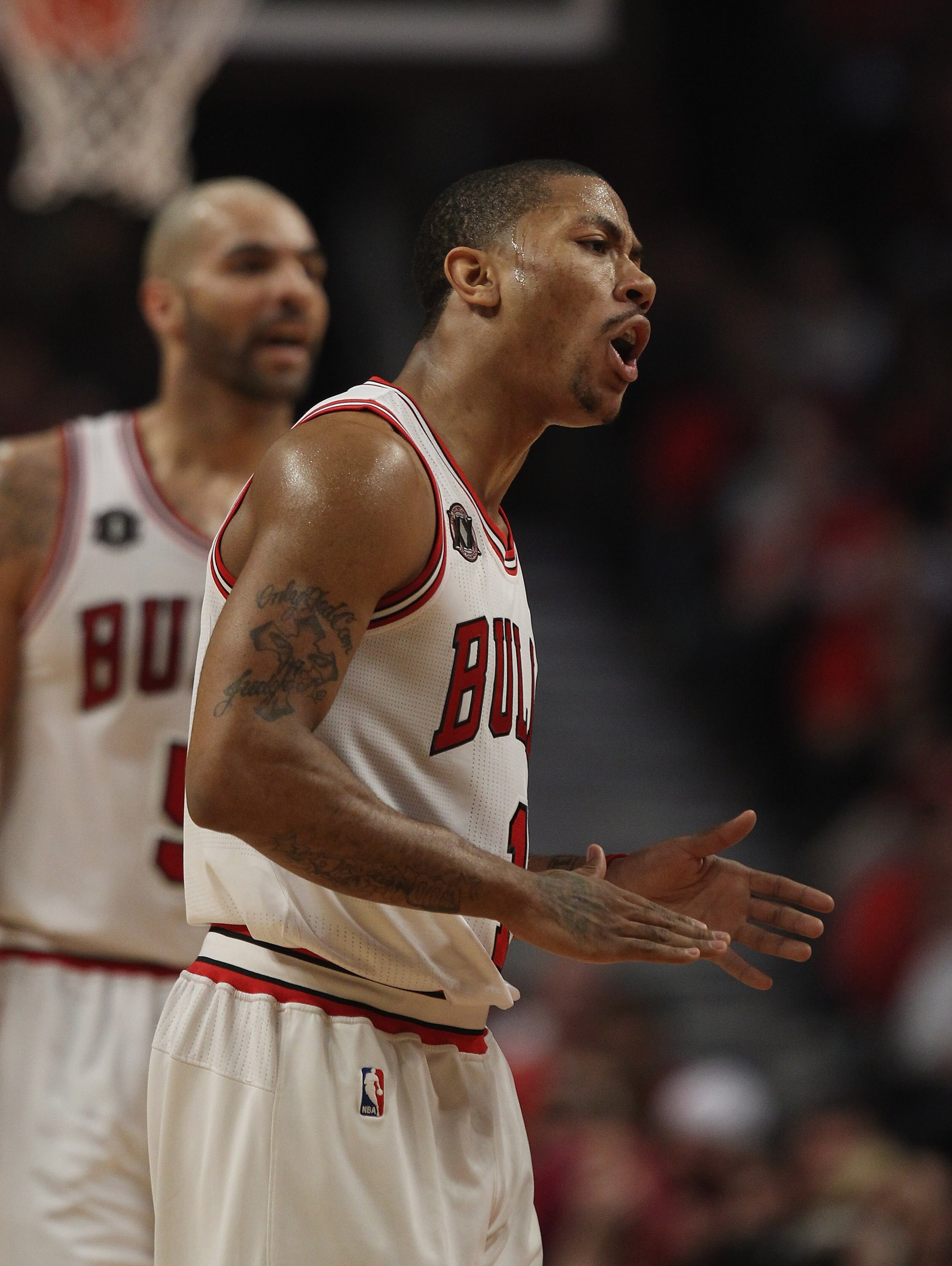 CHICAGO, IL - APRIL 18: Derrick Rose #1 of the Chicago Bulls encourages his teammates against the Indiana Pacers in Game Two of the Eastern Conference Quarterfinals in the 2011 NBA Playoffs at the United Center on April 18, 2011 in Chicago, Illinois.The B