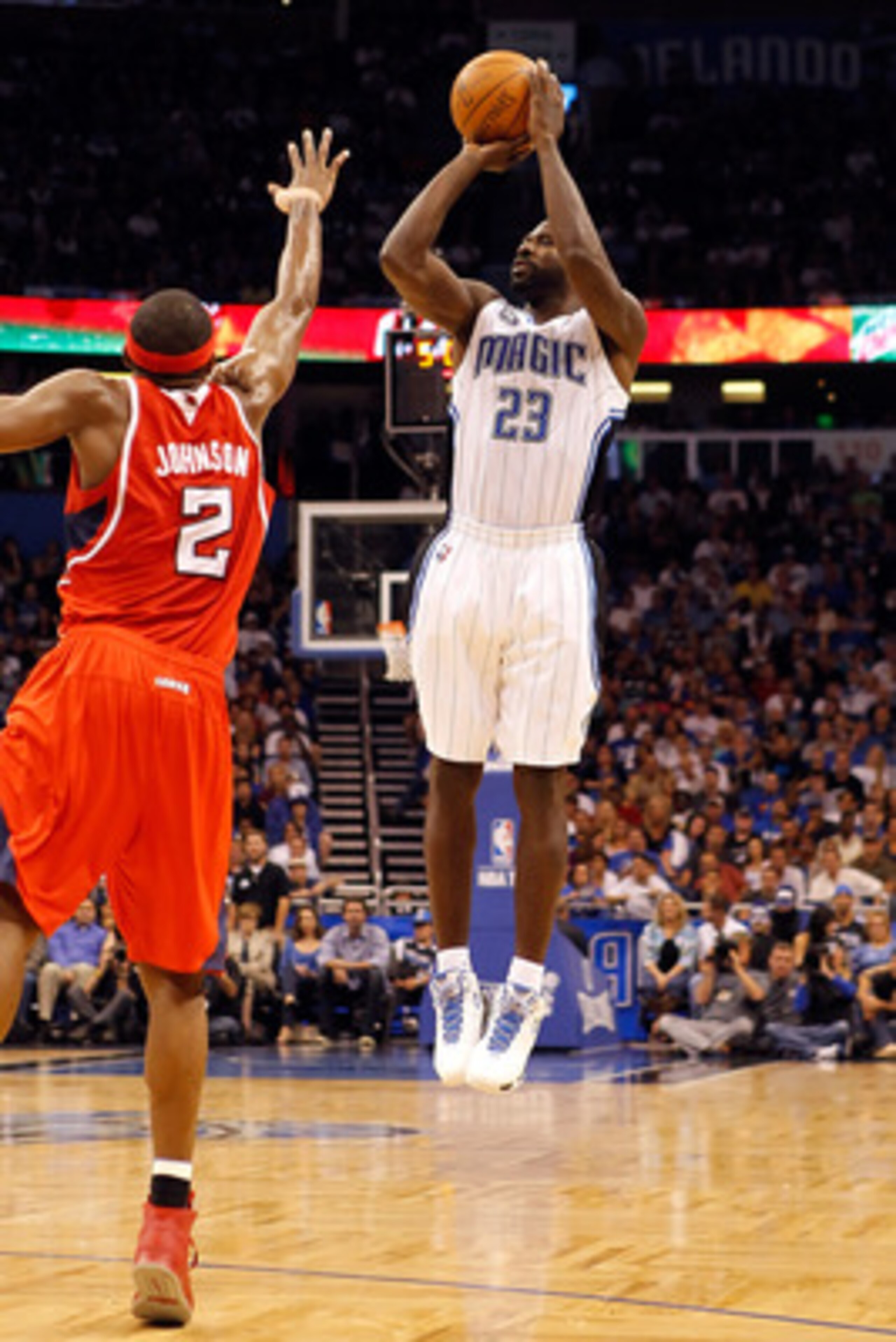 ORLANDO, FL - APRIL 19: Jason Richardson #23 of the Orlando Magic shoots over Joe Johnson #2 of the Atlanta Hawks of the Orlando Magic during Game Two of the Eastern Conference Quarterfinals of the 2011 NBA Playoffs on April 19, 2011 at the Amway Arena i ORLANDO, FL - APRIL 19: Jason Richardson #23 of the Orlando Magic shoots over Joe Johnson #2 of the Atlanta Hawks of the Orlando Magic during Game Two of the Eastern Conference Quarterfinals of the 2011 NBA Playoffs on April 19, 2011 at the Amway Arena i