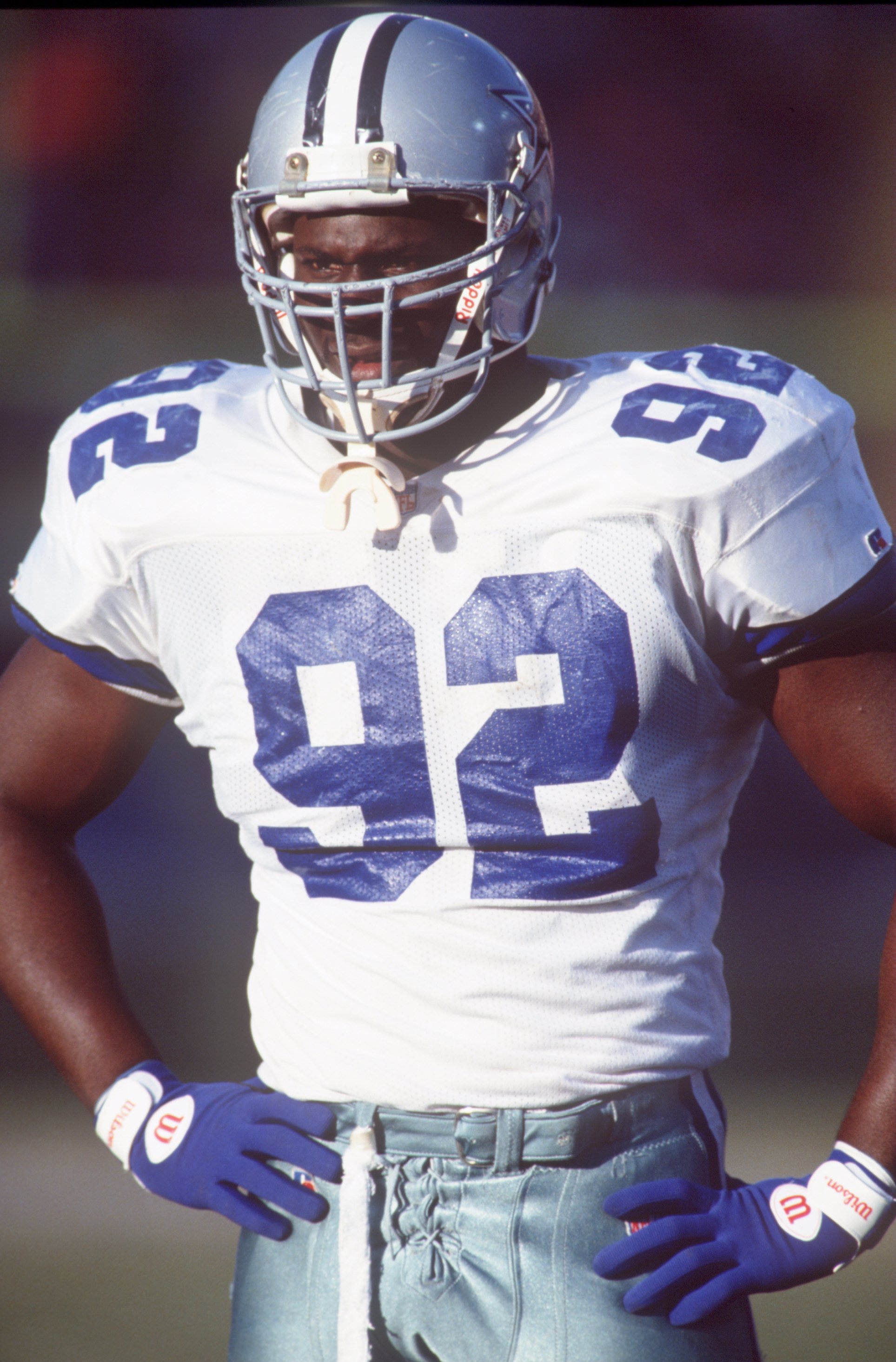 6 Dec 1992: DEFENSIVE LINEMAN TONY TOLBERT OF THE DALLAS COWBOYS LOOKS TO THE SIDELINE DURING THE COWBOYS 31-27 VICTORY OVER THE DENVER BRONCOS AT MILE HIGH STADIUM IN DENVER, COLORADO.
