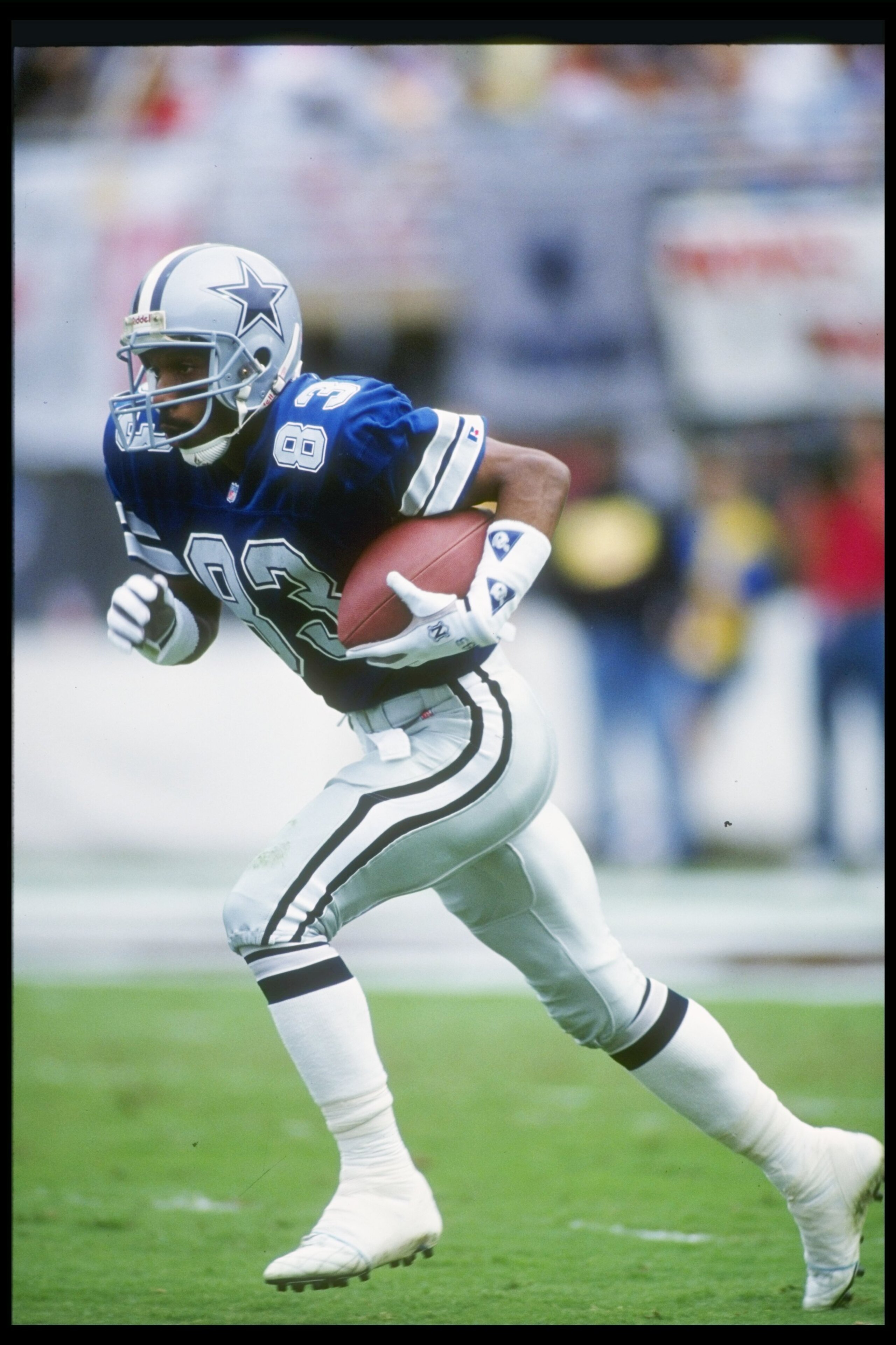 22 Nov 1992:  Wide receiver Kelvin Martin of the Dallas Cowboys moves the ball during a game against the Phoenix Cardinals at Sun Devil Stadium in Tempe, Arizona.  The Cowboys won the game, 16-10. Mandatory Credit: Otto Greule Jr.  /Allsport