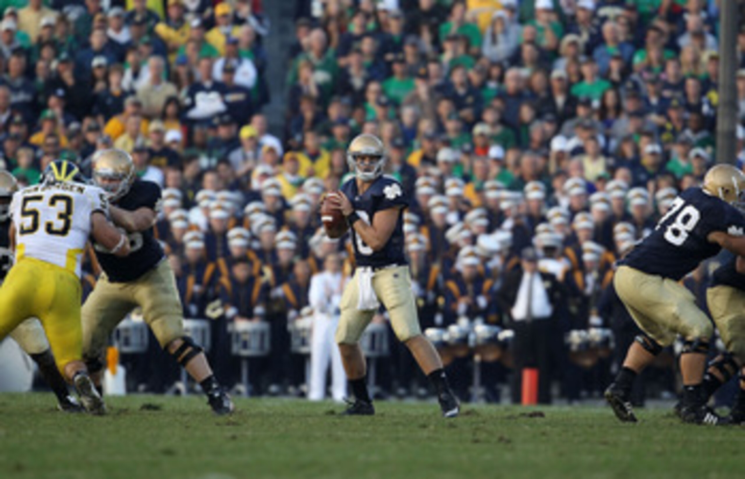 SOUTH BEND, IN - SEPTEMBER 11: Dayne Crist #10 of the Notre Dame Fighting Irish looks for a receiver in the 4th quarter against the Michigan Wolverines at Notre Dame Stadium on September 11, 2010 in South Bend, Indiana. Michigan defeated Notre Dame 28-24.