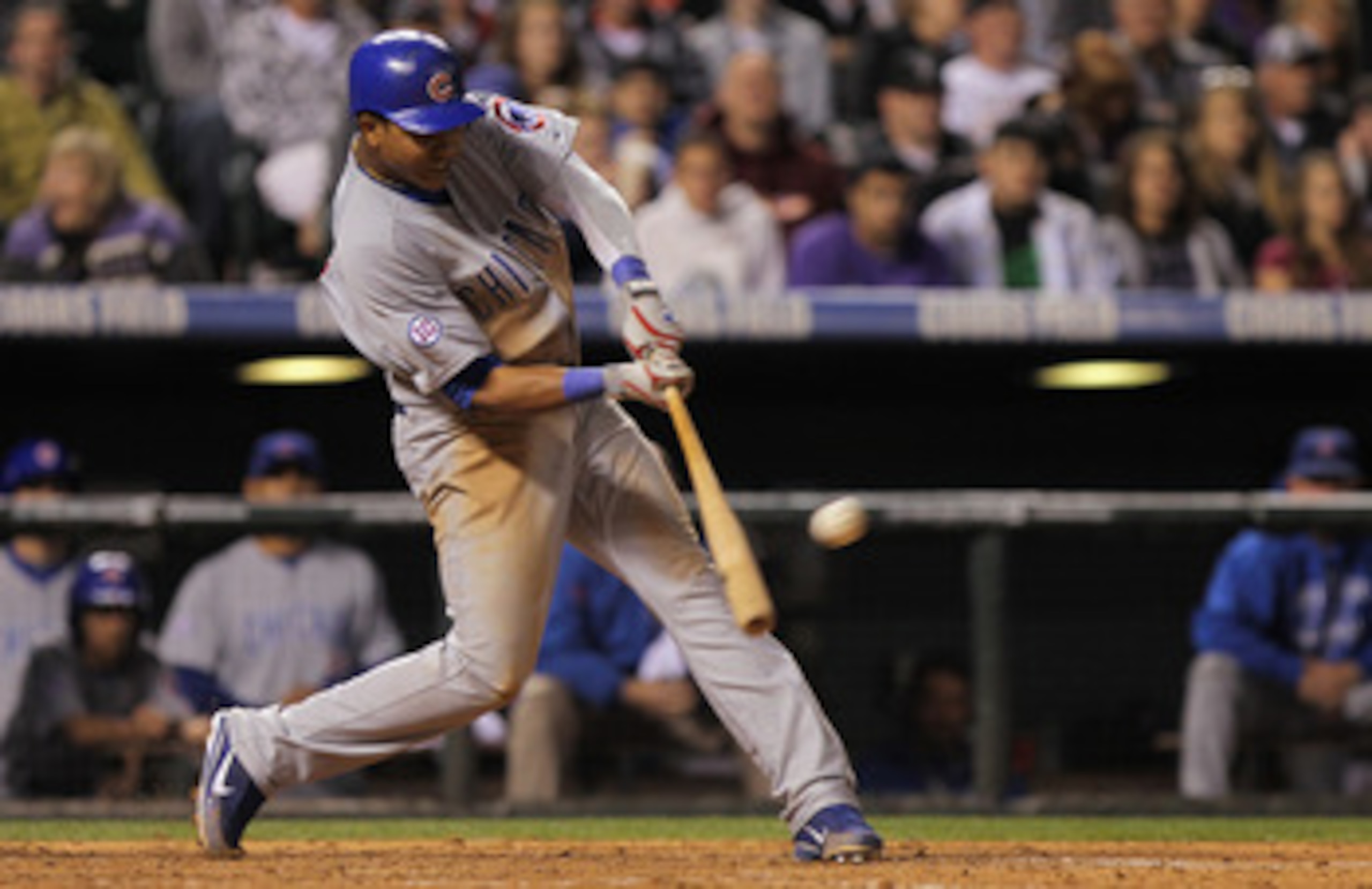 DENVER, CO - APRIL 16: Starlin Castro #13 of the Chicago Cubs hits a three run homerun off of relief pitcher Felipe Paulino #55 of the Colorado Rockies in the seventh inning at Coors Field on April 16, 2011 in Denver, Colorado. (Photo by Doug Pensinger/ DENVER, CO - APRIL 16: Starlin Castro #13 of the Chicago Cubs hits a three run homerun off of relief pitcher Felipe Paulino #55 of the Colorado Rockies in the seventh inning at Coors Field on April 16, 2011 in Denver, Colorado. (Photo by Doug Pensinger/