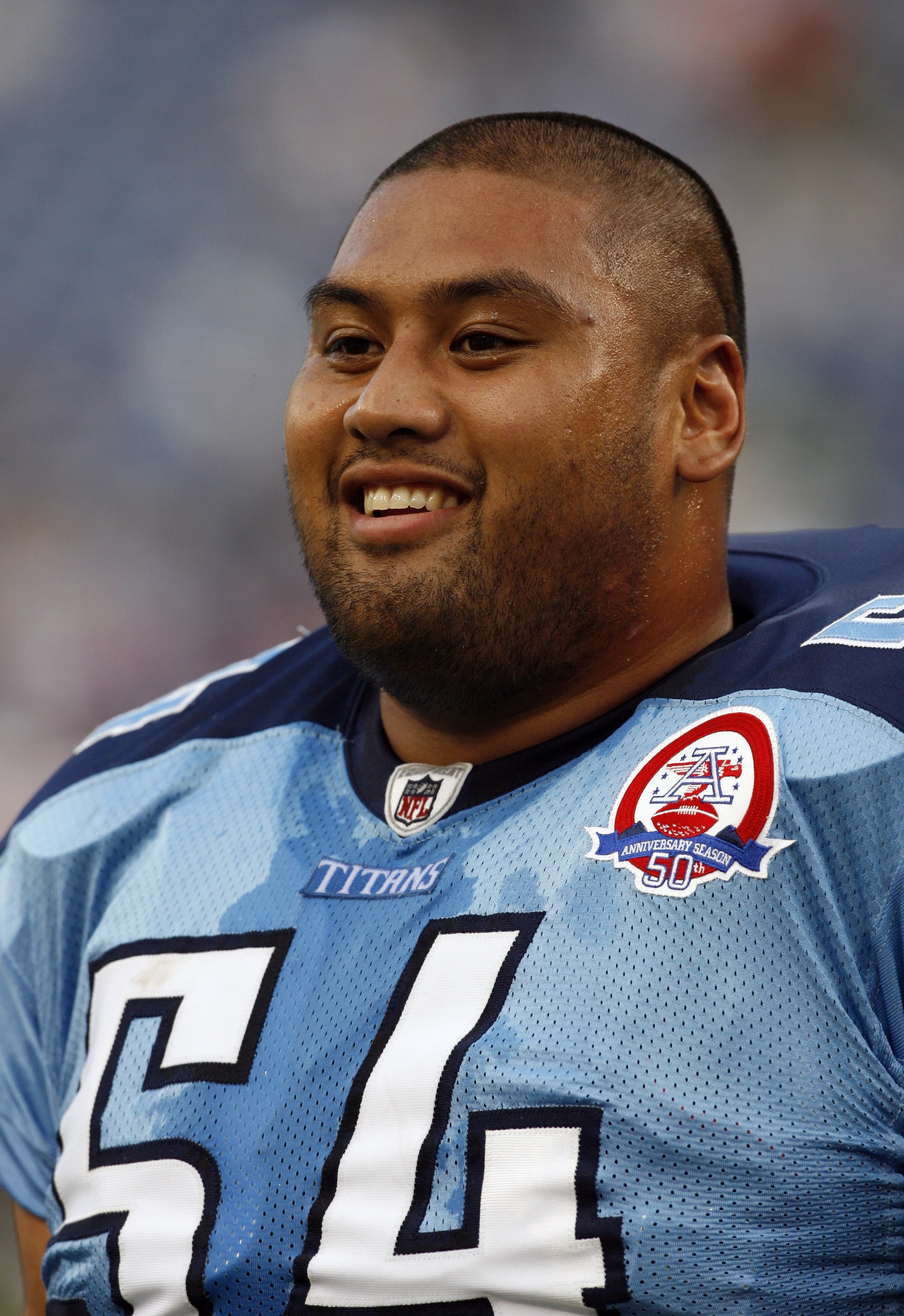 NASHVILLE, TN - AUGUST 15: Eugene Amano #54 of the Tennessee Titans smiles during pregame warmups against the Tampa Bay Buccaneers during a preseason NFL game at LP Field on August 15, 2009 in Nashville, Tennessee. The Titans beat the Buccaneers 27-20. (P