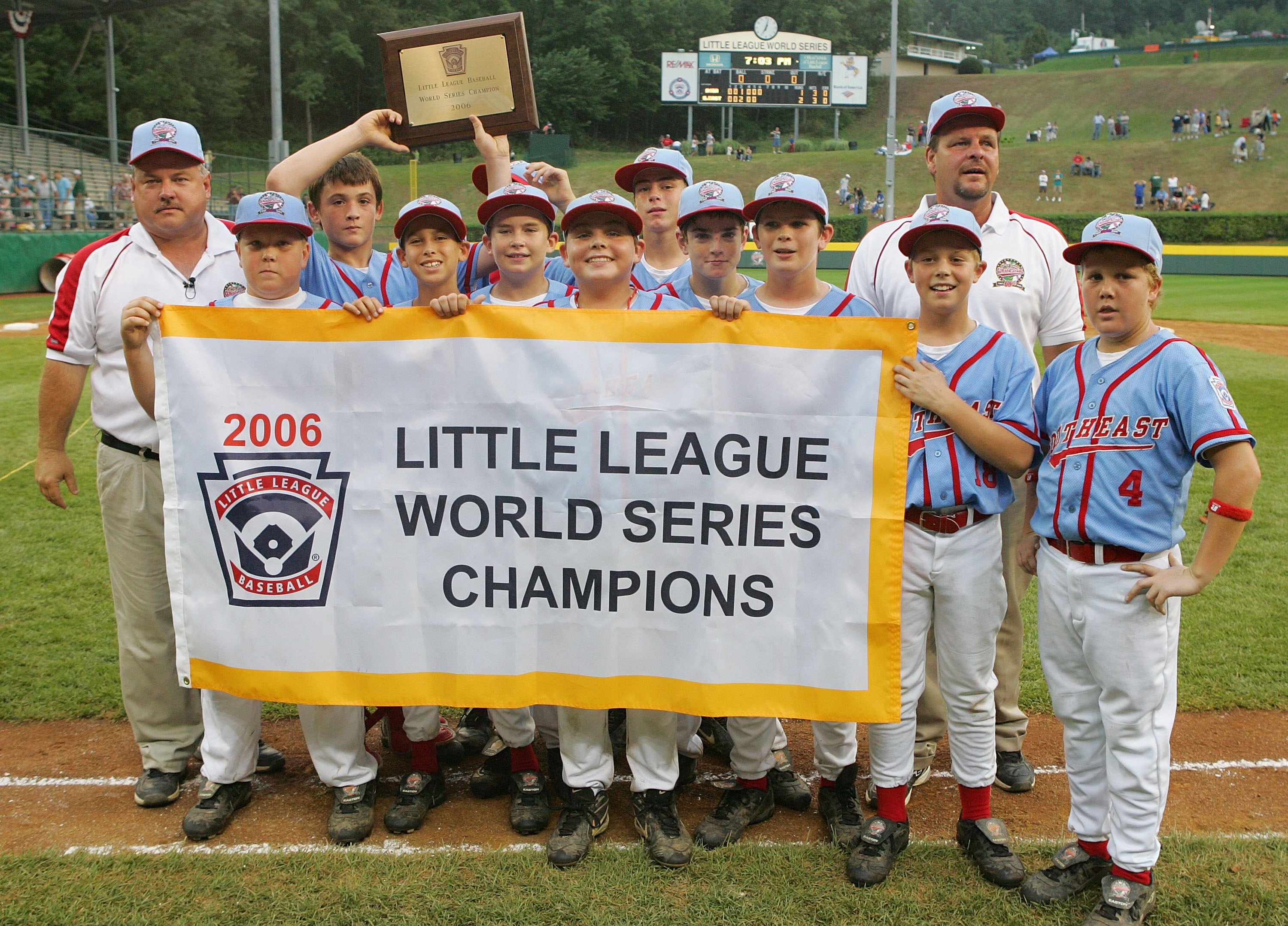 SOUTH WILLIAMSPORT, PA - AUGUST 28:  The Southeast team from Columbus, Georgia pose with their banner after defeating the Asian team from Kawaguchi City, Japan during the Championship game of the Little League World Series on August 28, 2006 at Lamade Sta