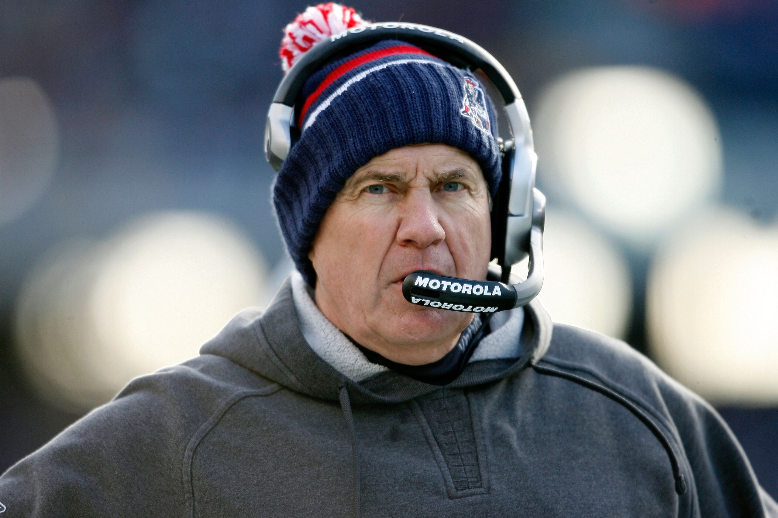 FOXBORO, MA - JANUARY 10:  Head coach Bill Belichick of the New England Patriots looks on against the Baltimore Ravens during the 2010 AFC wild-card playoff game at Gillette Stadium on January 10, 2010 in Foxboro, Massachusetts.  (Photo by Elsa/Getty Imag