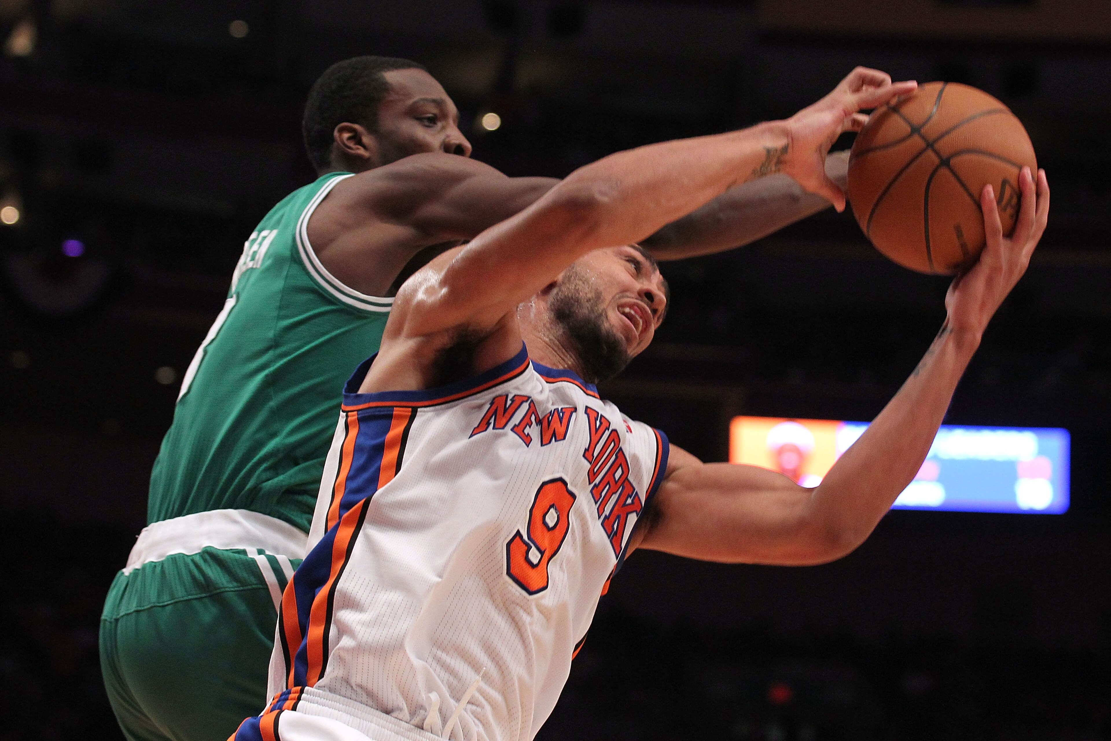 NEW YORK, NY - APRIL 22: Jared Jeffries #9 of the New York Knicks fights for a rebound against Jeff Green #8 of the Boston Celtics in Game Three of the Eastern Conference Quarterfinals in the 2011 NBA Playoffs on April 22, 2011 at Madison Square Garden i NEW YORK, NY - APRIL 22: Jared Jeffries #9 of the New York Knicks fights for a rebound against Jeff Green #8 of the Boston Celtics in Game Three of the Eastern Conference Quarterfinals in the 2011 NBA Playoffs on April 22, 2011 at Madison Square Garden i