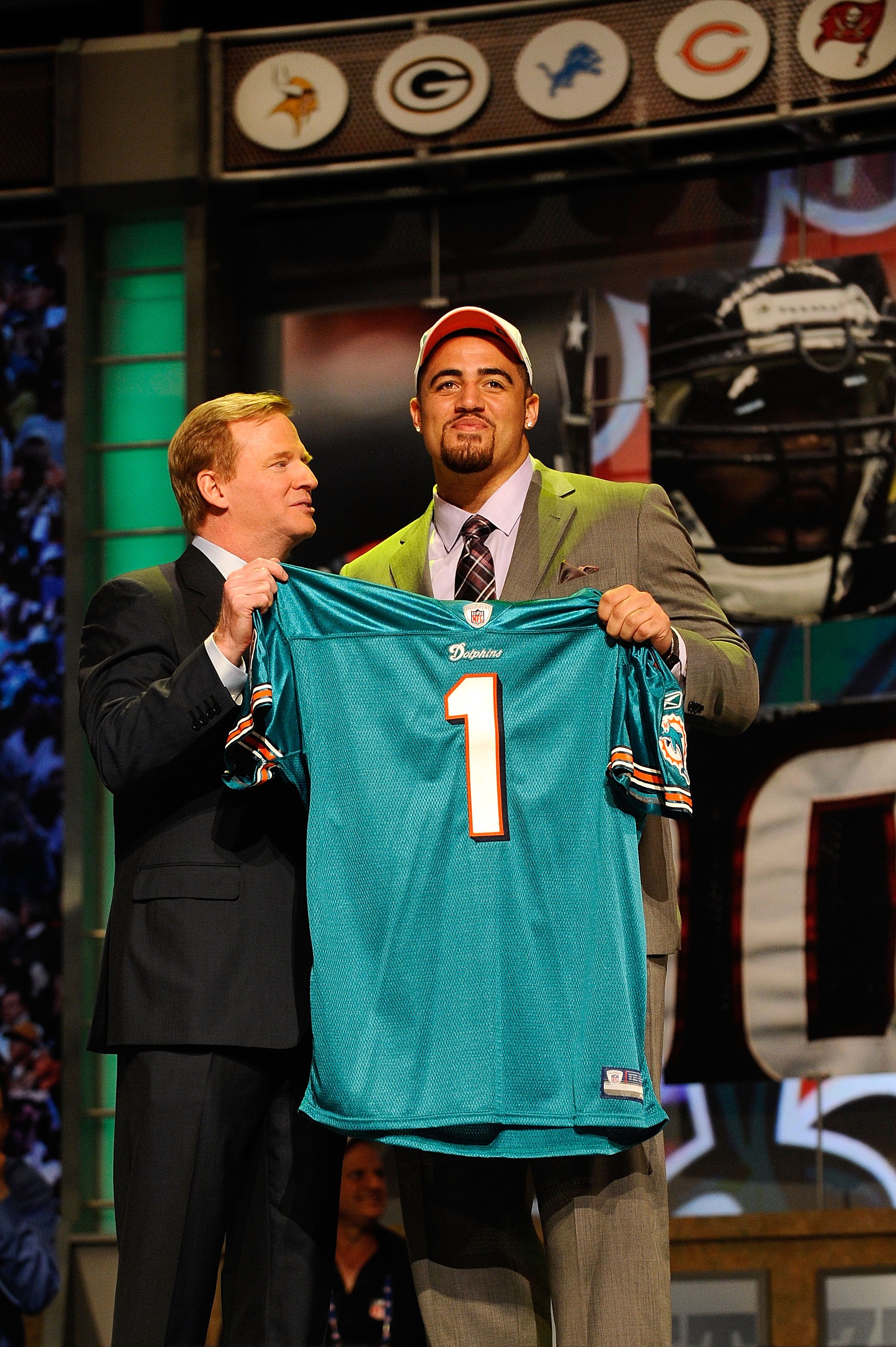 NEW YORK - APRIL 22:  Jared Odrick (R) from Penn State poses with NFL Commissioner Roger Goodell as they hold up a Miami Dolphins jersey after the Dolphins selected Odrick number 28 overall during the first round of the 2010 NFL Draft at Radio City Music