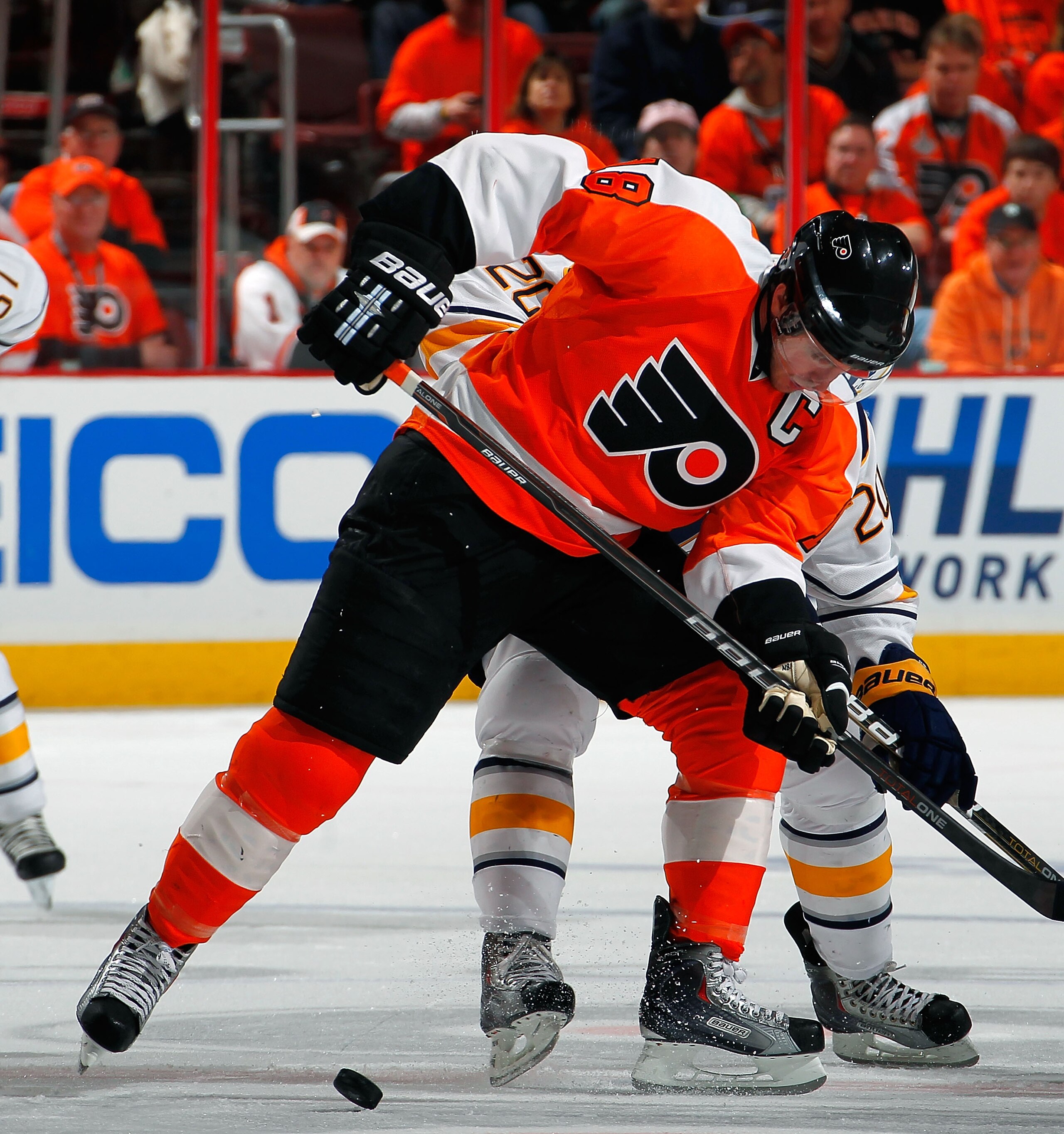 PHILADELPHIA, PA - APRIL 16:  Mike Richards #18 of the Philadelphia Flyers battles for a faceoff in Game Two of the Eastern Conference Quarterfinals against the Buffalo Sabres during the 2011 NHL Stanley Cup Playoffs at Wells Fargo Center on April 16, 201