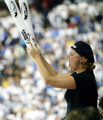 TAMPA, FL - MAY 27:  A Tampa Bay Lightning fan cheers using thundersticks in the third period against the Calgary Flames in game two of the NHL Stanley Cup Finals on May 27, 2004 at the St. Pete Times Forum in Tampa, Florida.  (Photo by Doug Pensinger/Get