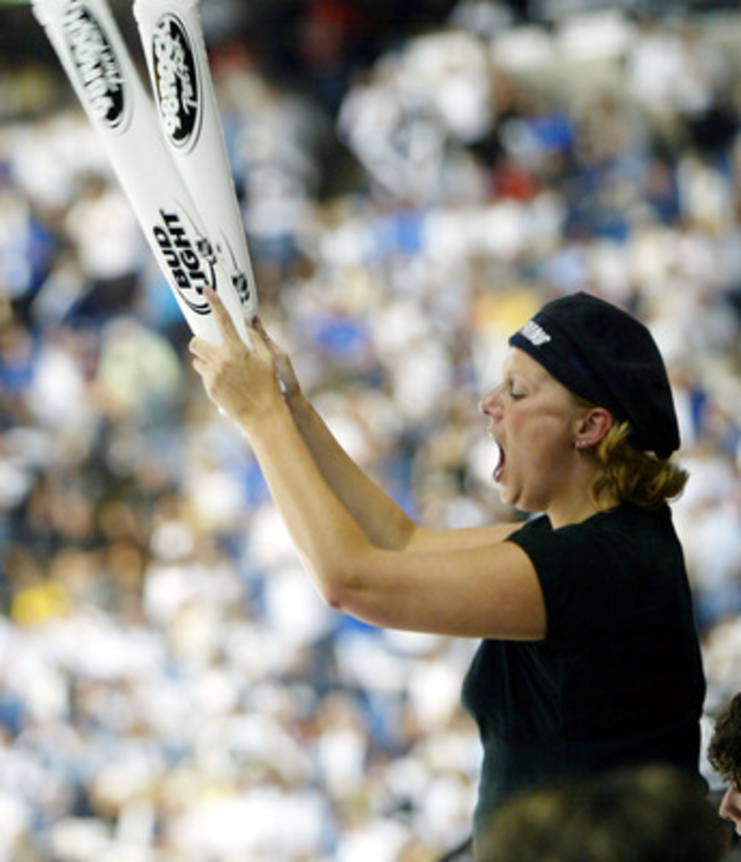 TAMPA, FL - MAY 27:  A Tampa Bay Lightning fan cheers using thundersticks in the third period against the Calgary Flames in game two of the NHL Stanley Cup Finals on May 27, 2004 at the St. Pete Times Forum in Tampa, Florida.  (Photo by Doug Pensinger/Get