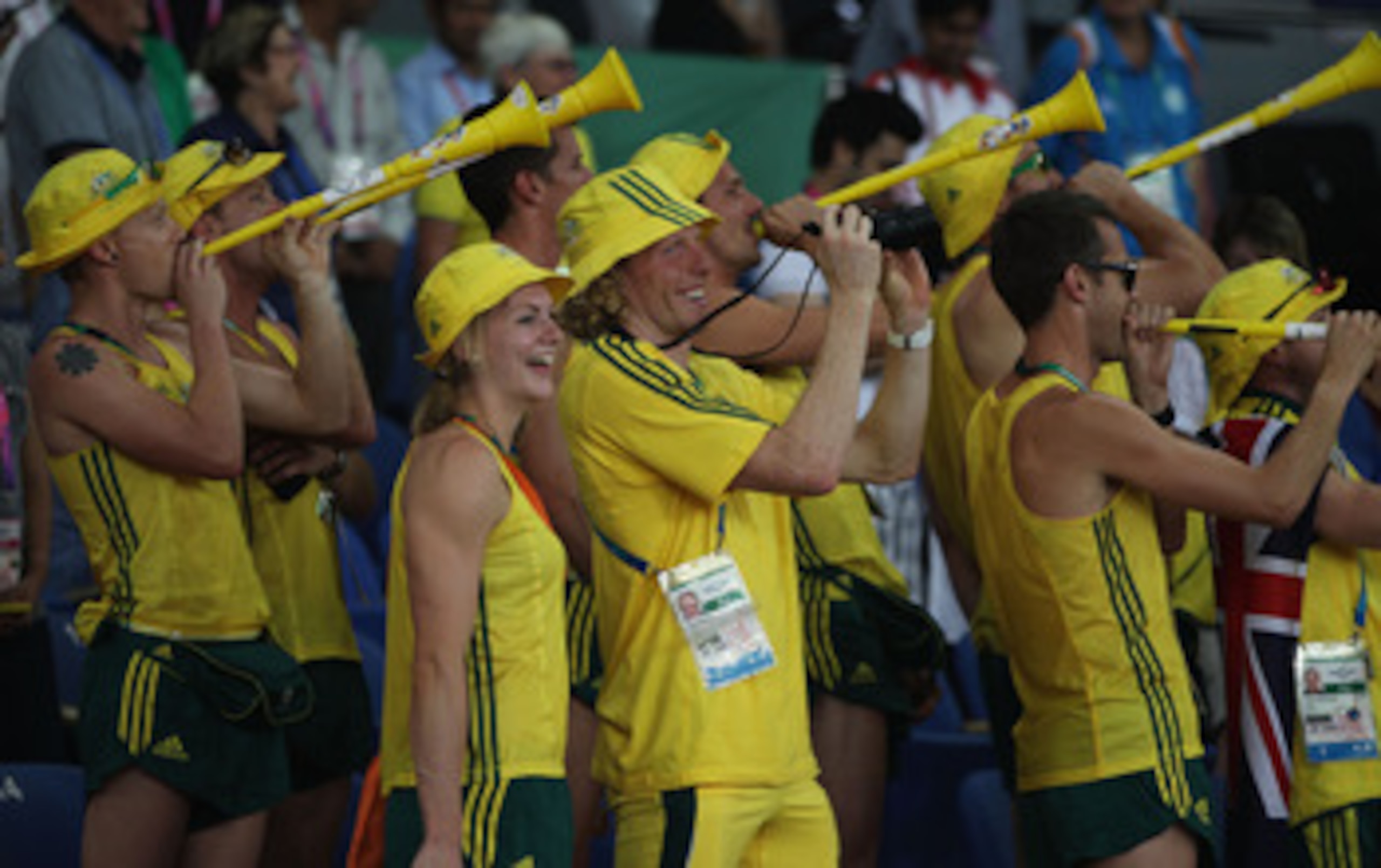DELHI, INDIA - OCTOBER 12:  Members of the Australia team blow vuvuzelas at Jawaharlal Nehru Stadium during day nine of the Delhi 2010 Commonwealth Games on October 12, 2010 in Delhi, India.  (Photo by Michael Steele/Getty Images)