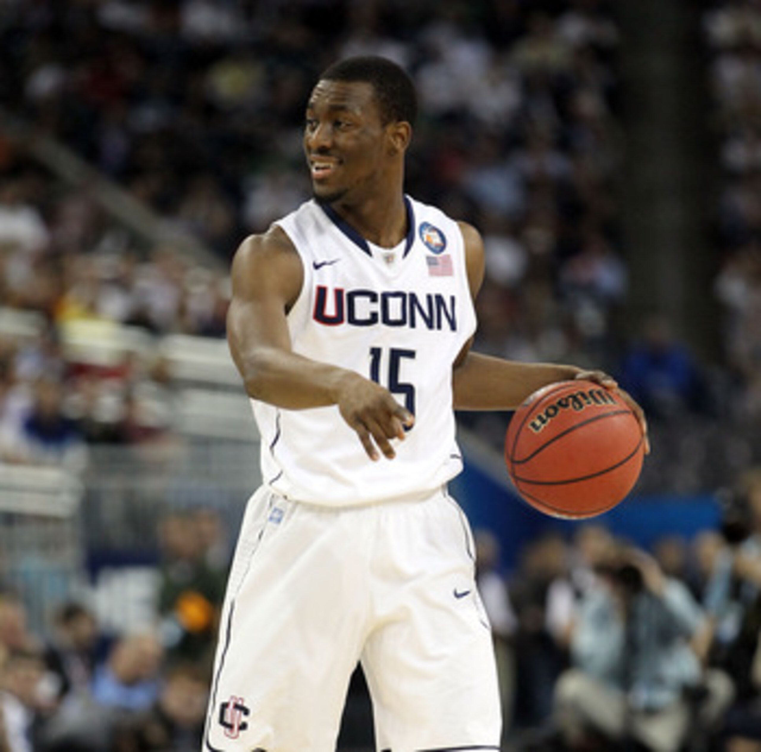 HOUSTON, TX - APRIL 04: Kemba Walker #15 of the Connecticut Huskies handles the ball against the Butler Bulldogs during the National Championship Game of the 2011 NCAA Division I Men's Basketball Tournament at Reliant Stadium on April 4, 2011 in Houston, HOUSTON, TX - APRIL 04: Kemba Walker #15 of the Connecticut Huskies handles the ball against the Butler Bulldogs during the National Championship Game of the 2011 NCAA Division I Men's Basketball Tournament at Reliant Stadium on April 4, 2011 in Houston,