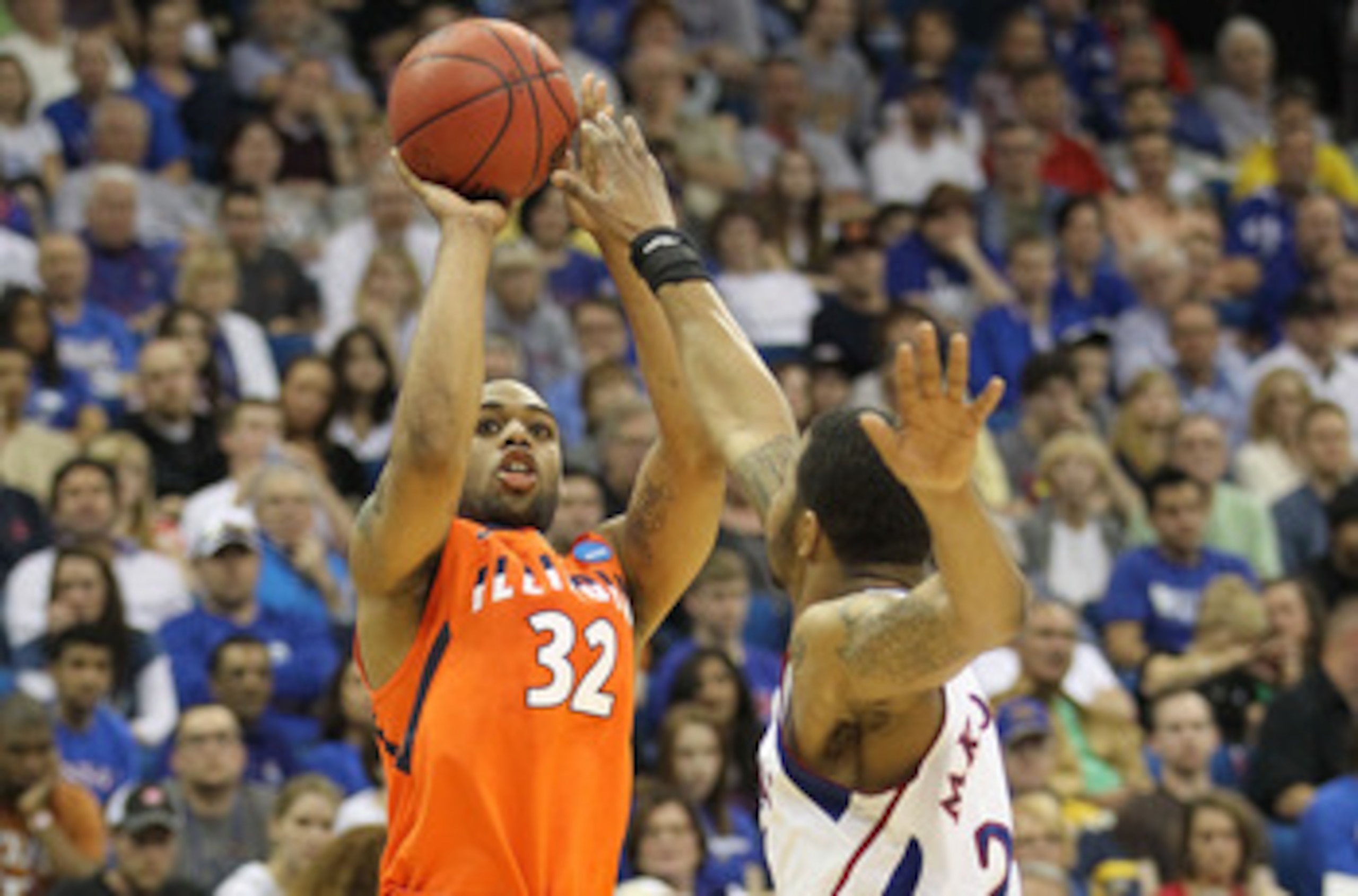 TULSA, OK - MARCH 20: Demetri McCamey #32 of the Illinois Fighting Illini takes a shot over Markieff Morris #21 of the Kansas Jayhawks during the third round of the 2011 NCAA men's basketball tournament at BOK Center on March 20, 2011 in Tulsa, Oklahoma. TULSA, OK - MARCH 20: Demetri McCamey #32 of the Illinois Fighting Illini takes a shot over Markieff Morris #21 of the Kansas Jayhawks during the third round of the 2011 NCAA men's basketball tournament at BOK Center on March 20, 2011 in Tulsa, Oklahoma.