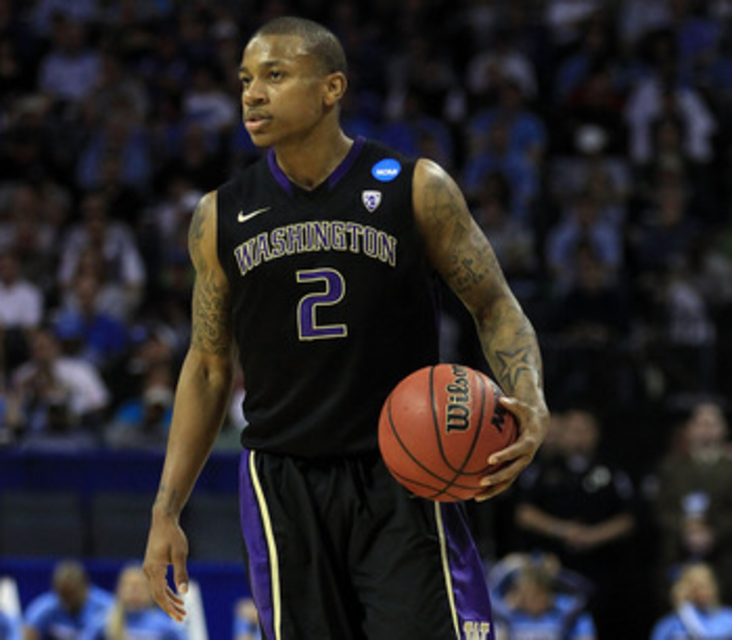 CHARLOTTE, NC - MARCH 20: Isaiah Thomas #2 of the Washington Huskies moves the ball while taking on the North Carolina Tar Heels during the third round of the 2011 NCAA men's basketball tournament at Time Warner Cable Arena on March 20, 2011 in Charlotte CHARLOTTE, NC - MARCH 20: Isaiah Thomas #2 of the Washington Huskies moves the ball while taking on the North Carolina Tar Heels during the third round of the 2011 NCAA men's basketball tournament at Time Warner Cable Arena on March 20, 2011 in Charlotte