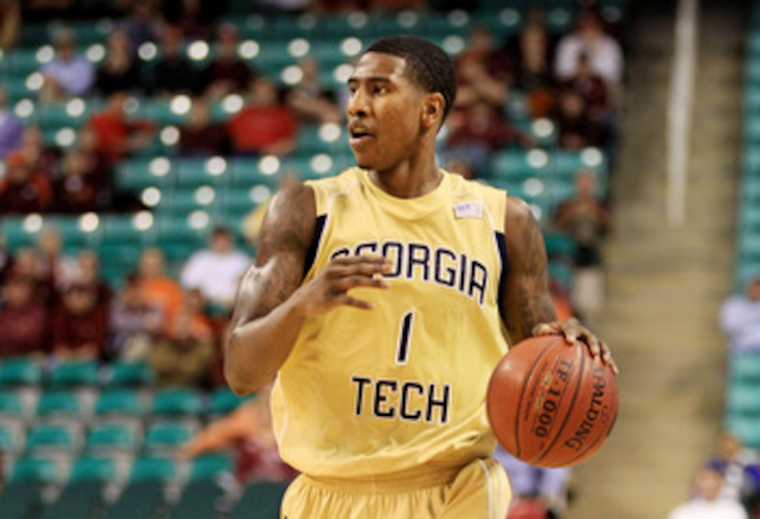 GREENSBORO, NC - MARCH 10: Iman Shumpert #1 of the Georgia Tech Yellow Jackets dribbles down the court during the second half of the game against the Virginia Tech Hokies in the first round of the 2011 ACC men's basketball tournament at the Greensboro Co GREENSBORO, NC - MARCH 10: Iman Shumpert #1 of the Georgia Tech Yellow Jackets dribbles down the court during the second half of the game against the Virginia Tech Hokies in the first round of the 2011 ACC men's basketball tournament at the Greensboro Co