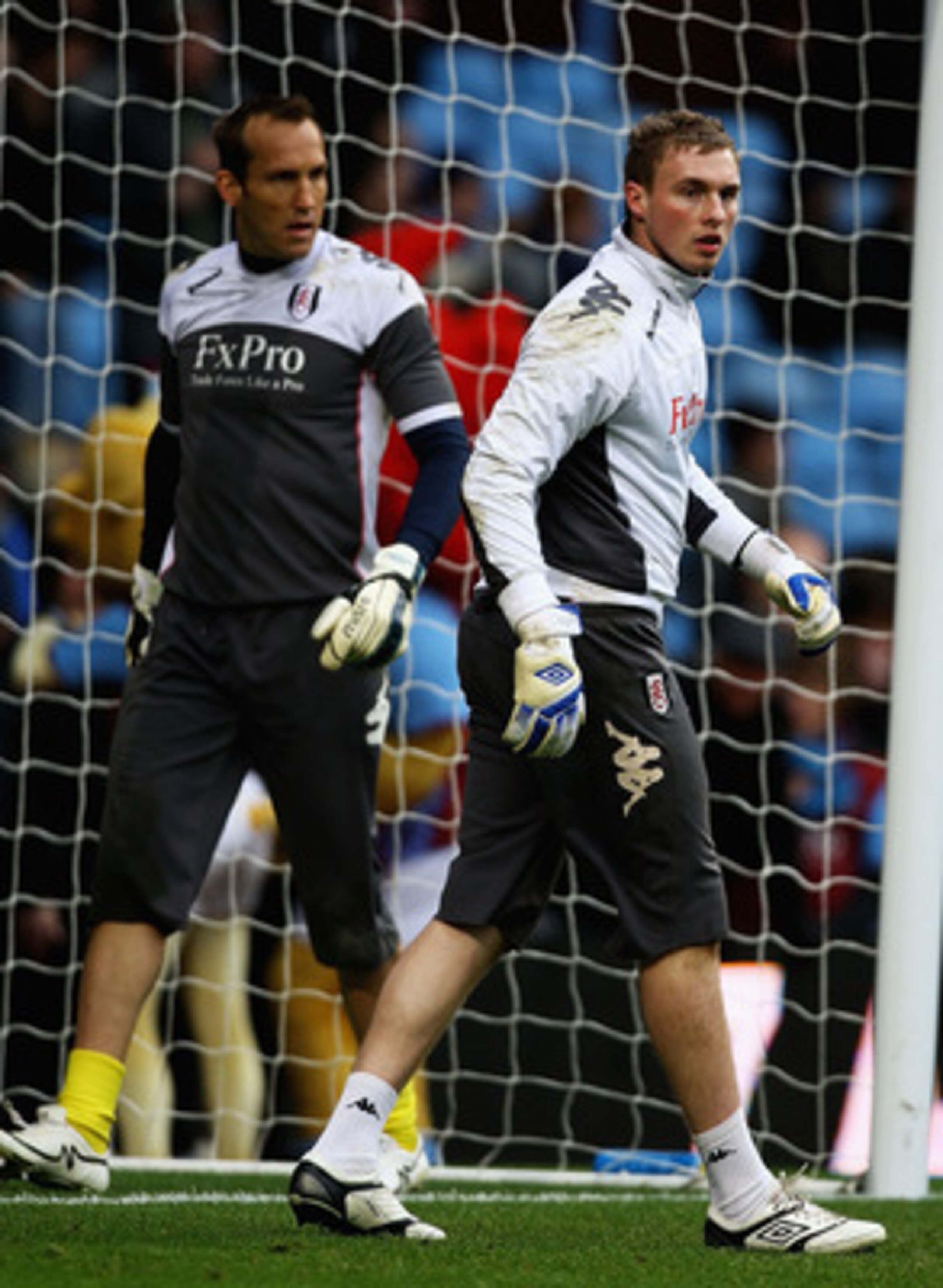 BIRMINGHAM, ENGLAND - FEBRUARY 05:  Mark Schwarzer and David Stockdale of Fulham look on ahead of the Barclays Premier League match between Aston Villa and Fulham at Villa Park on February 5, 2011 in Birmingham, England.  (Photo by Matthew Lewis/Getty Ima