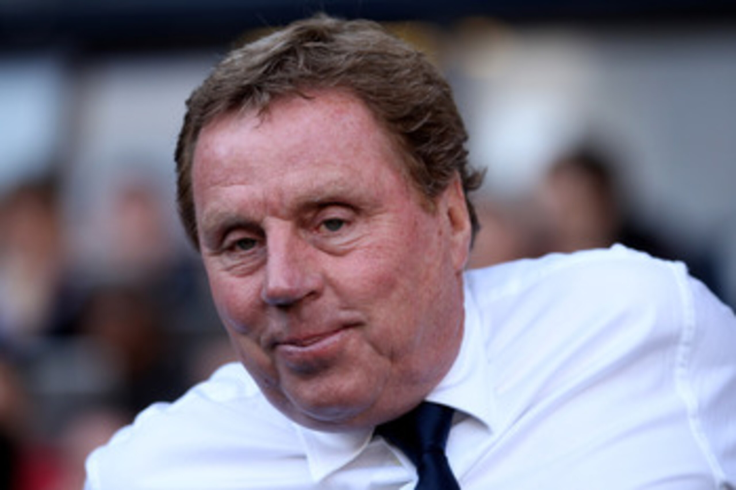 LONDON, ENGLAND - APRIL 09: Manager Harry Redknapp of Spurs smiles during the Barclays Premier League match between Tottenham Hotspur and Stoke City at White Hart Lane on April 9, 2011 in London, England.  (Photo by Ian Walton/Getty Images)