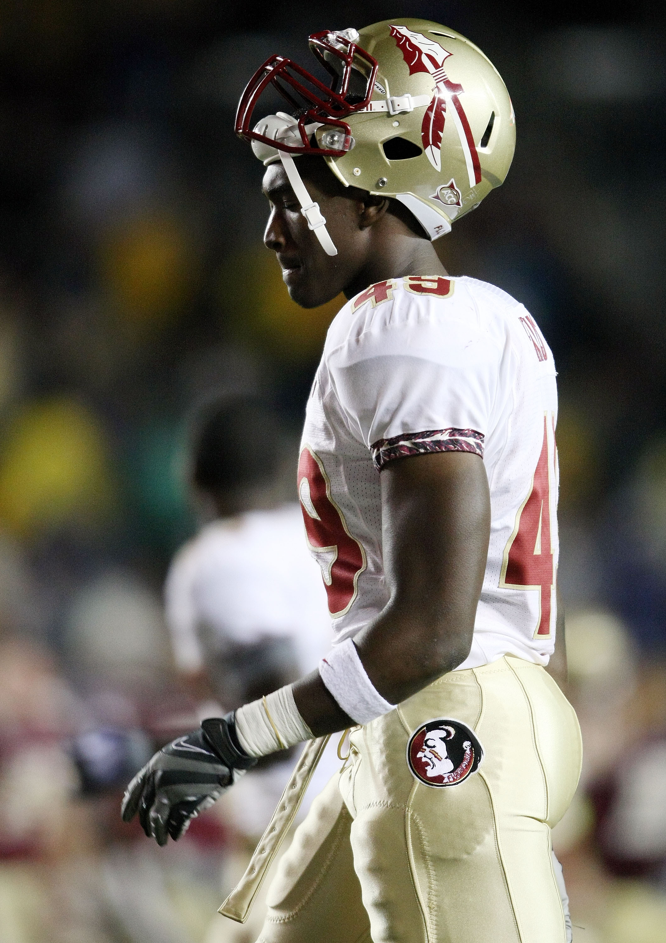 CHESTNUT HILL, MA - OCTOBER 03:  Brandon Jenkins #49 of the Florida State Seminoles walks off the field after the game against the Boston College Eagles on October 3, 2009 at Alumni Stadium in Chestnut Hill, Massachusetts. Boston College defeated Florida 