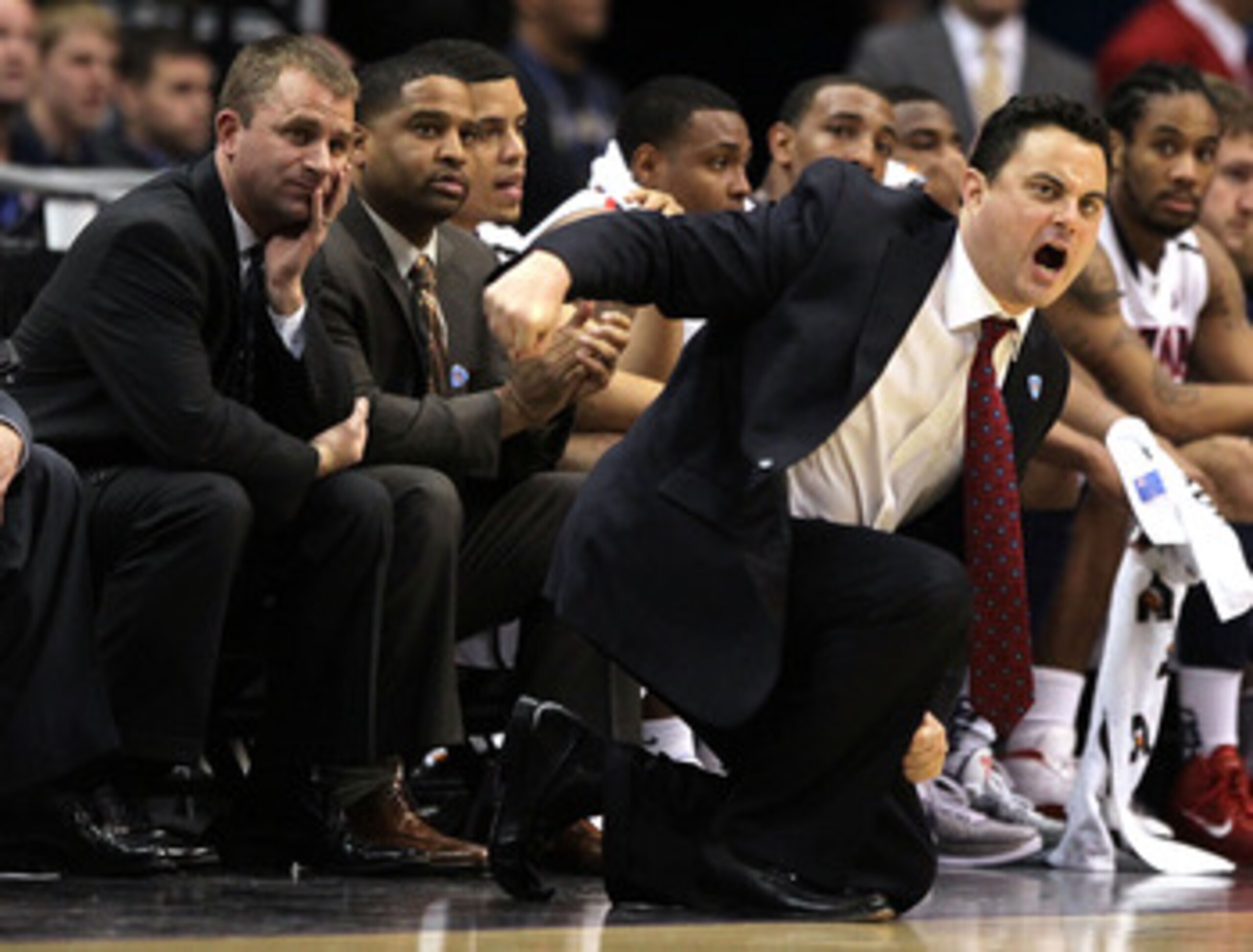 LOS ANGELES, CA - MARCH 10:  Head coach Sean Miller of the Arizona Wildcats calls out while taking on the Oregon State Beavers in the first half in the quarterfinals of the 2011 Pacific Life Pac-10 Men's Basketball Tournament at Staples Center on March 10