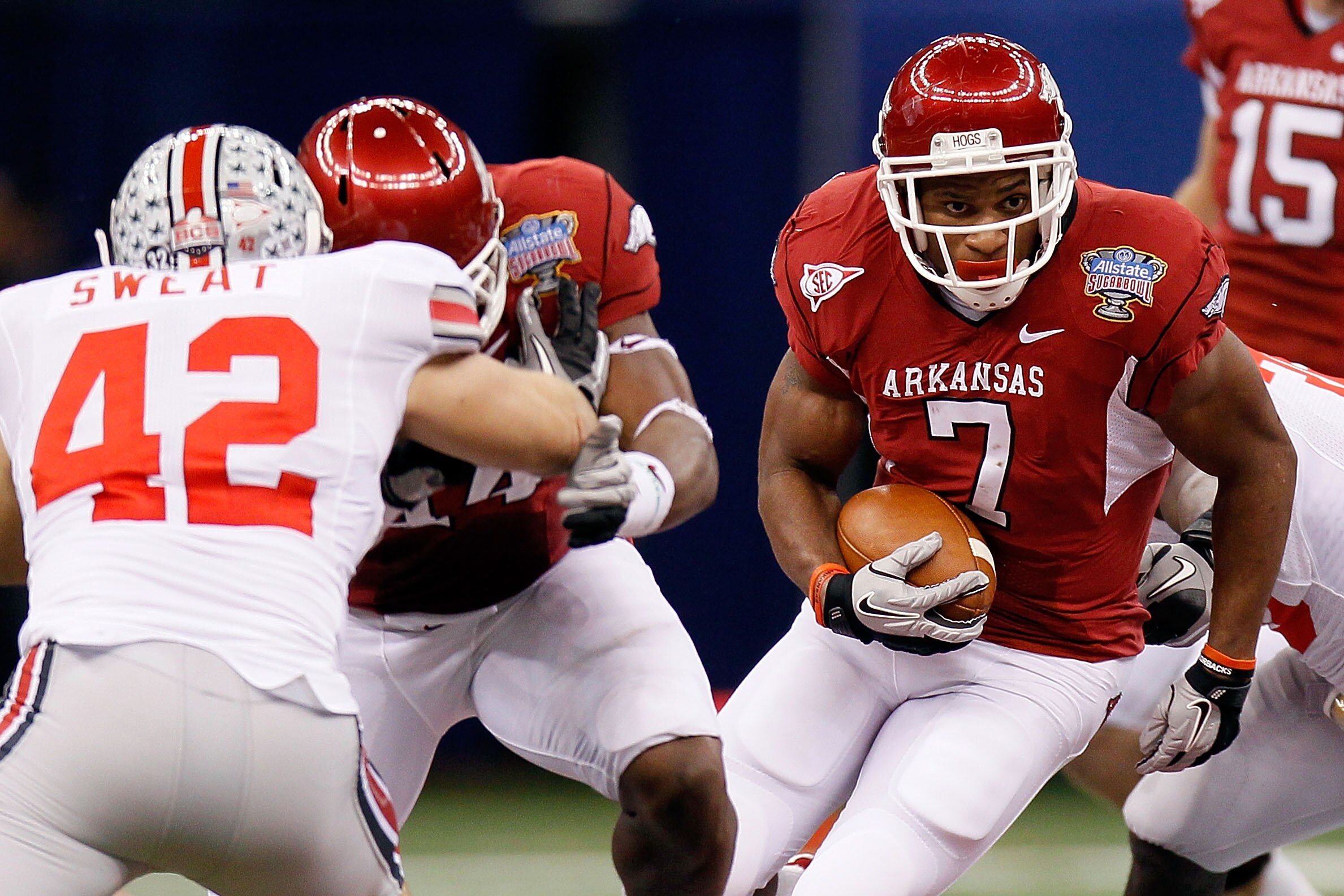 NEW ORLEANS, LA - JANUARY 04:  Knile Davis #7 of the Arkansas Razorbacks runs the ball against the Ohio State Buckeyes during the Allstate Sugar Bowl at the Louisiana Superdome on January 4, 2011 in New Orleans, Louisiana.  (Photo by Kevin C. Cox/Getty Im
