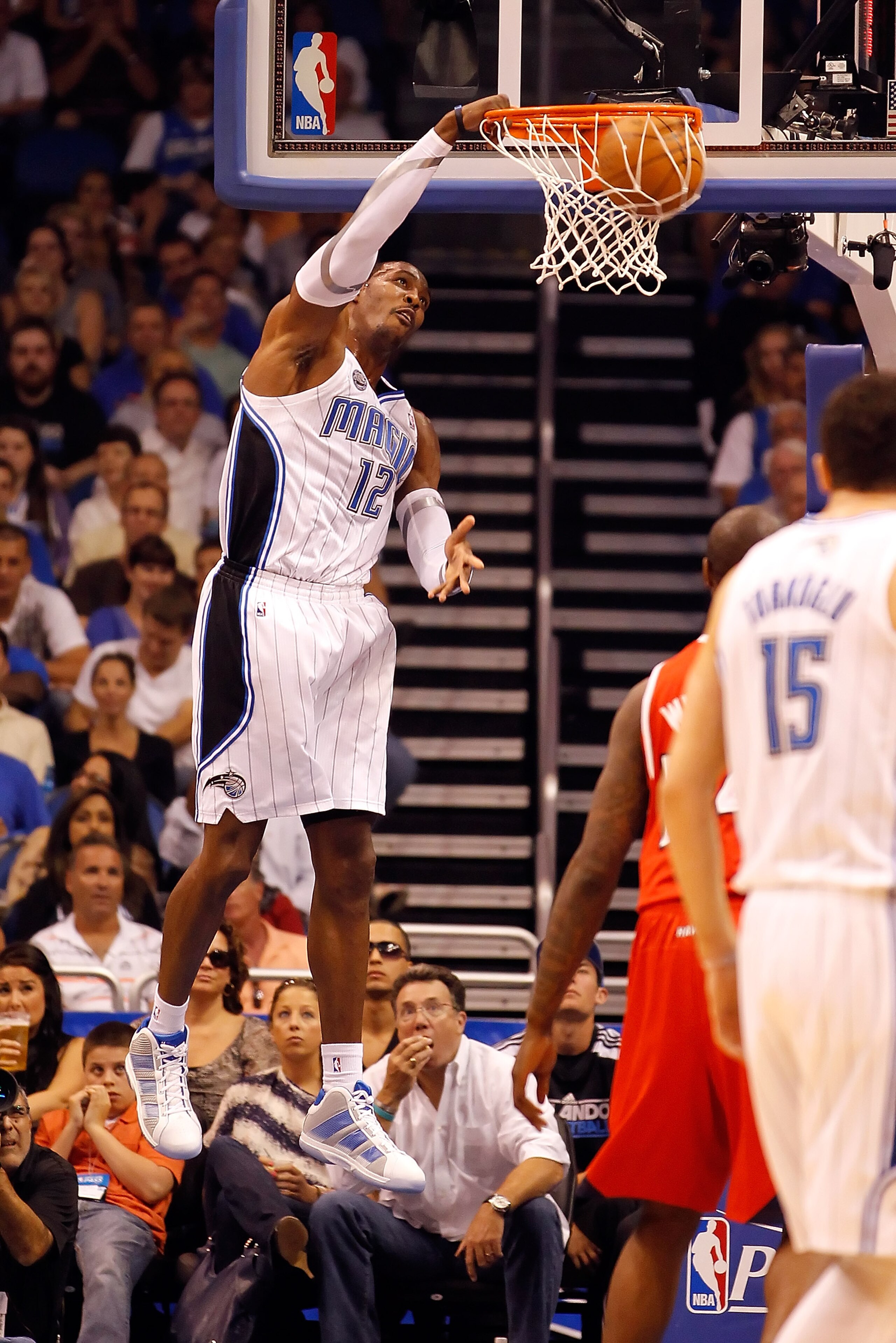 ORLANDO, FL - APRIL 16: Dwight Howard #12 of the Orlando Magic dunks against the Atlanta Hawks during Game One of the Eastern Conference Quarterfinals of the 2011 NBA Playoffs on April 16, 2011 at the Amway Arena in Orlando, Florida. NOTE TO USER: User ORLANDO, FL - APRIL 16: Dwight Howard #12 of the Orlando Magic dunks against the Atlanta Hawks during Game One of the Eastern Conference Quarterfinals of the 2011 NBA Playoffs on April 16, 2011 at the Amway Arena in Orlando, Florida. NOTE TO USER: User