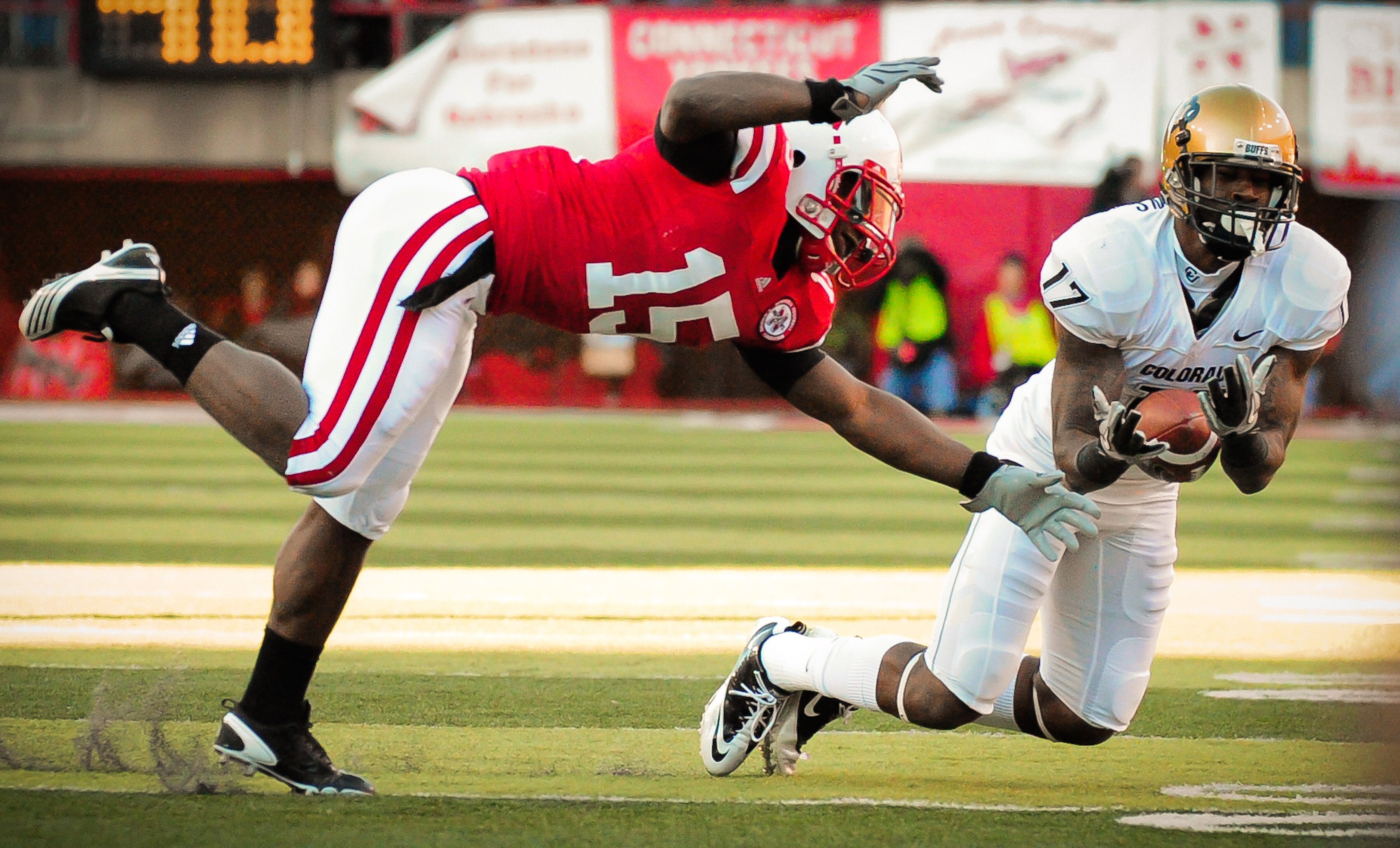 LINCOLN, NE - NOVEMBER 26: Alfonzo Dennard #15 of the Nebraska Cornhuskers attempts to break up a pass intended for Toney Clemons #17 of the Colorado Buffaloes during their game at Memorial Stadium on November 26, 2010 in Lincoln, Nebraska. Nebraska defea